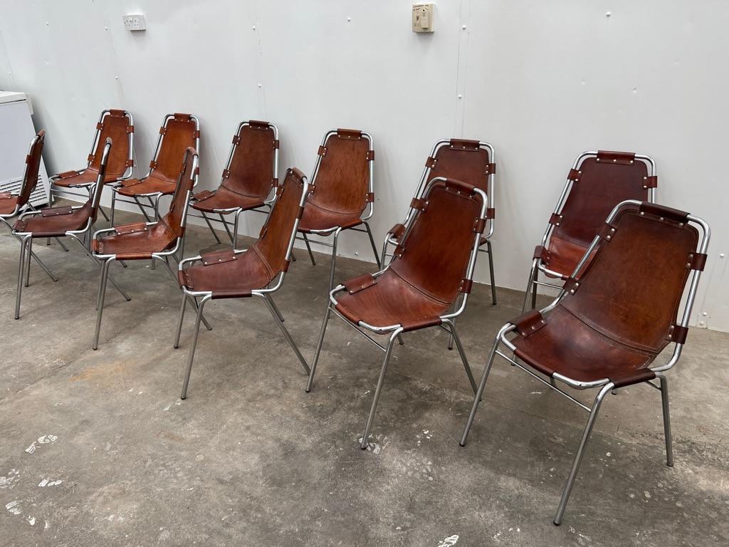 Selected by Charlotte Perriand for Les Arcs Ski Resort, 12 Leather Dining Chairs In Good Condition For Sale In Markington, GB
