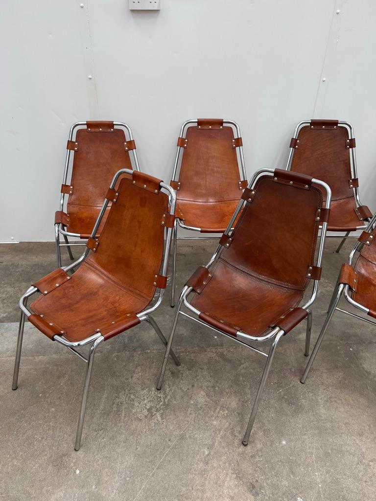 Métal Sélectionné par Charlotte Perriand pour la station de ski Les Arcs, 12 chaises à manger en cuir en vente