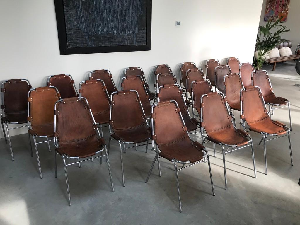 Selected by Charlotte Perriand for Les Arcs Ski Resort, 24 Leather Dining Chairs In Good Condition For Sale In Markington, GB