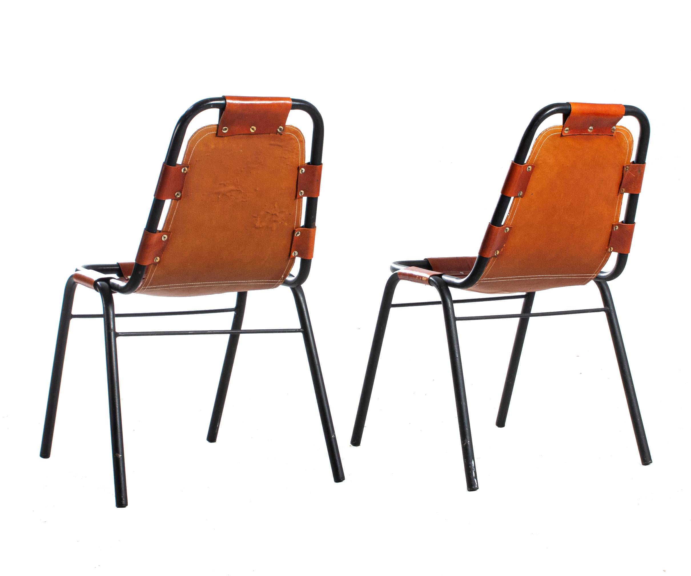 This well-constructed pair of chairs was manufactured by Dal Vera and selected by the influential designer and architect Charlotte Perriand (1903–1999) for the Les Arcs ski resort, located in the Alps of southeastern France. The project was one of