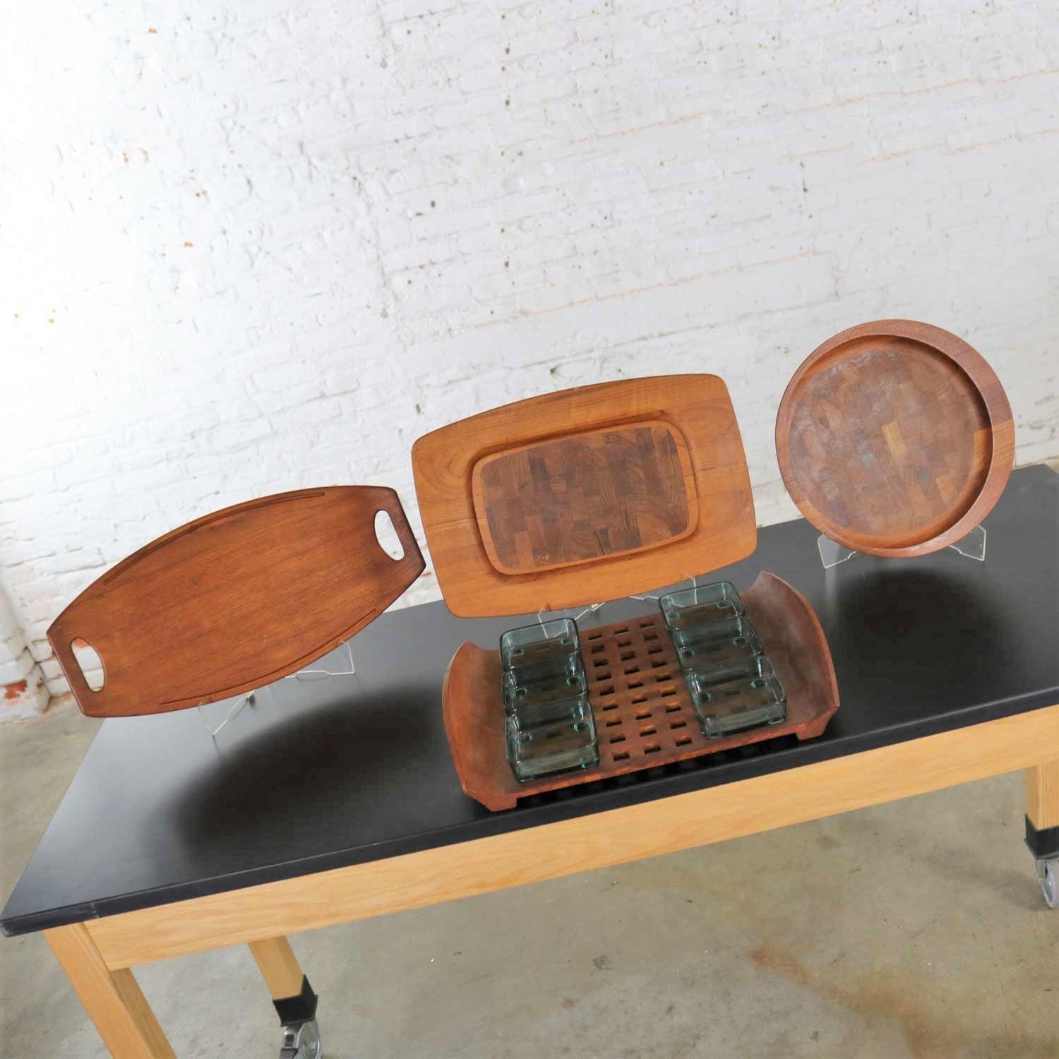 Nice selection of four different Dansk Designs trays or cutting boards designed by Jens Quistgaard. We have priced these individually so choose one, two, three, or four. They are all in fabulous vintage condition. Please see photos, circa mid-20th