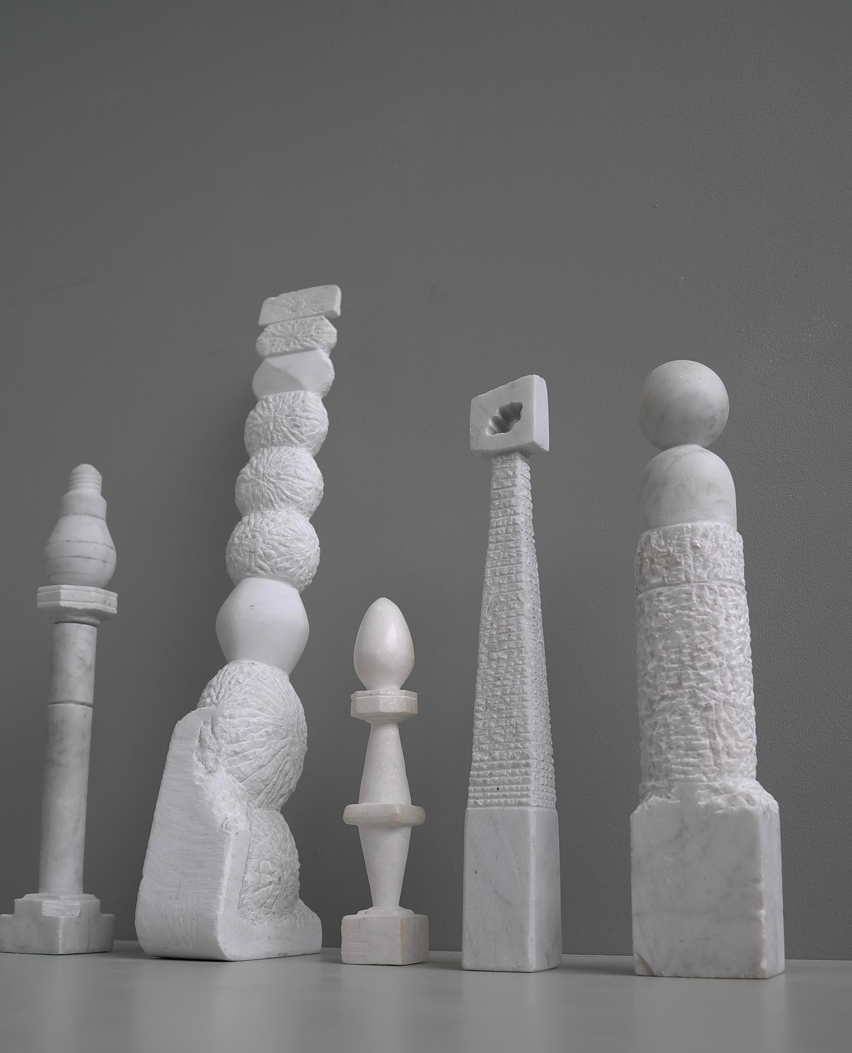 Selection of Decorative Abstract Marble Menhir Column Art Sculptures, circa 1970 by Gerrit Patist.

Sizes: Largest 57cm 
41 / 40 / 40 / smallest 26 cm

Gerrit Patist Visual Artist who received his training at the Artibus Academy and Center for