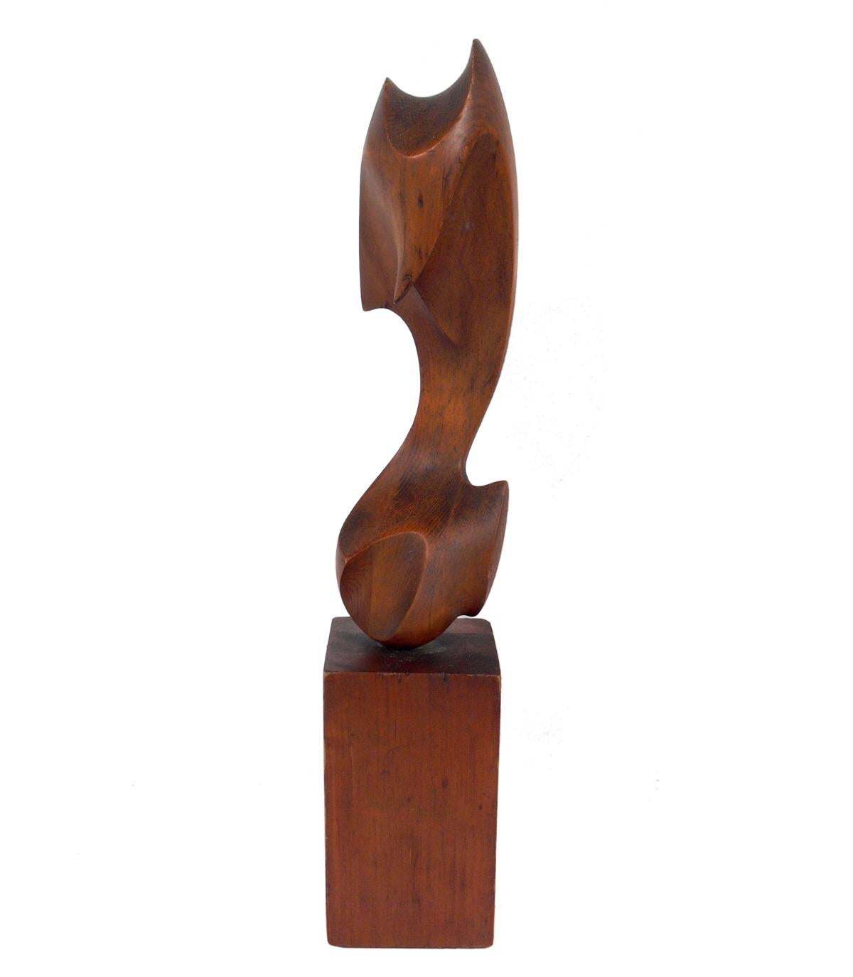 Selection of large abstract wood sculptures, circa 1960s. From left to right, the sculptures measure 25.5