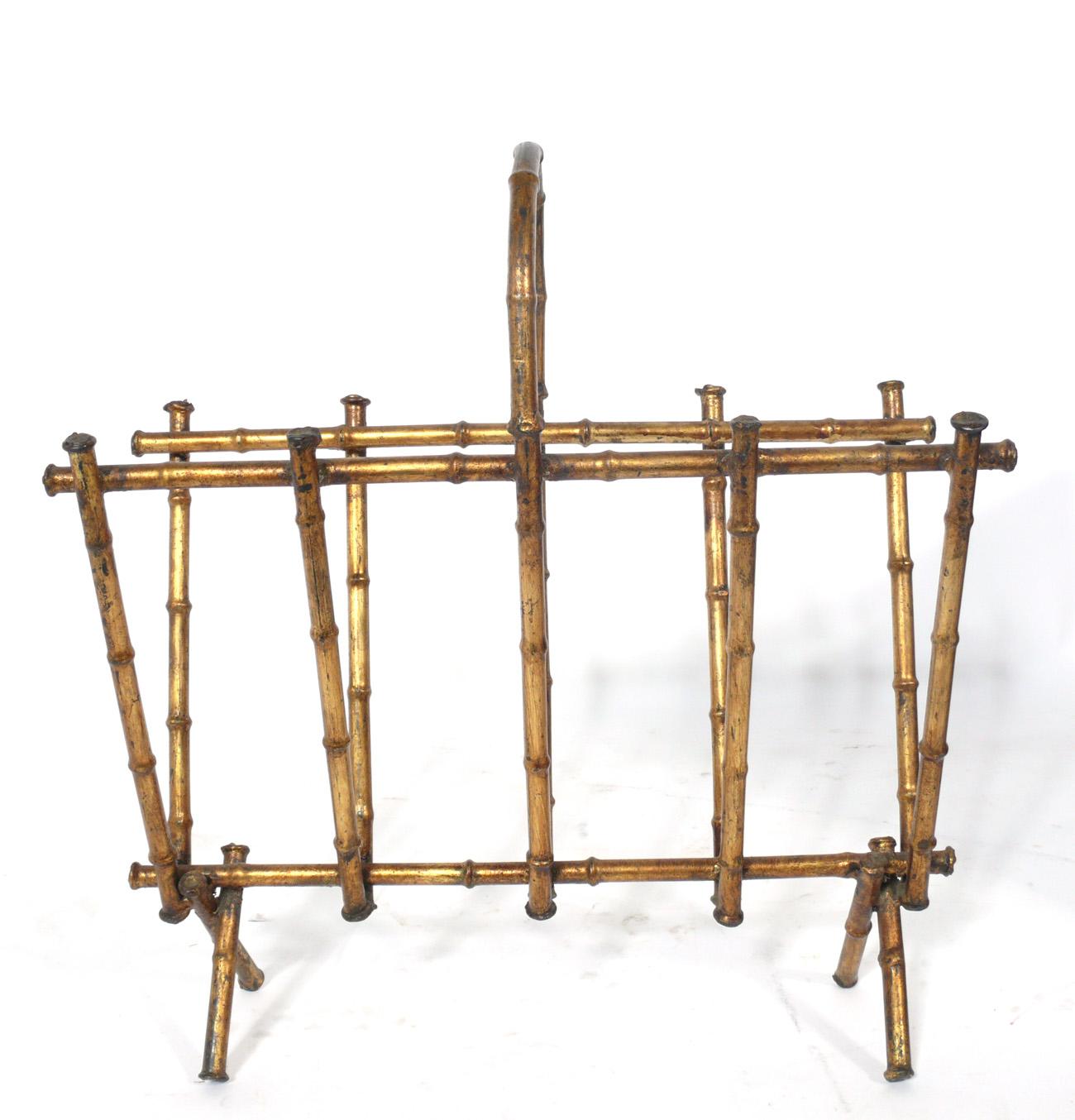 Selection of magazine racks or log holders, circa 19th century to 1950s. They are:
1) Italian gilt metal faux bamboo magazine rack, circa 1950s, seen at the top left. It measures: 18.5
