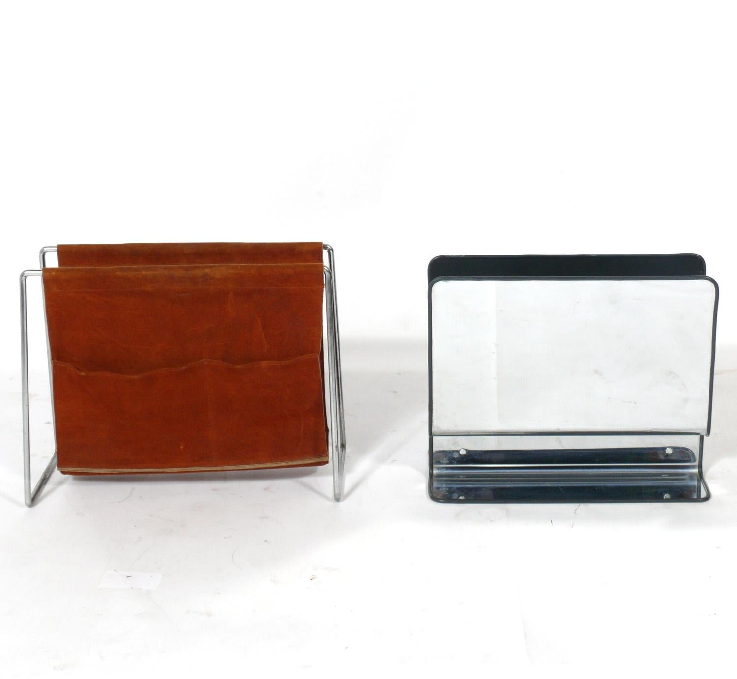 Selection of Mid-Century Modern magazine racks, circa 1960s. They are:
1) Danish modern suede and chrome magazine rack, in the manner of Poul Kjaerholm, seen at the top left. It measures, 17.25