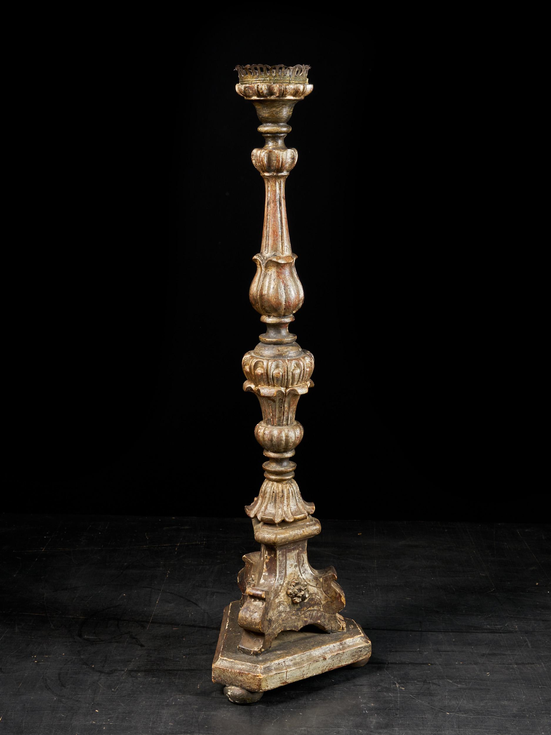 This is a nice selection of 20th century. Wooden candlesticks. They vary in shape and size and are Baroque inspired in style and detail. Nice patina and leftovers of polychrome give them a special charme.