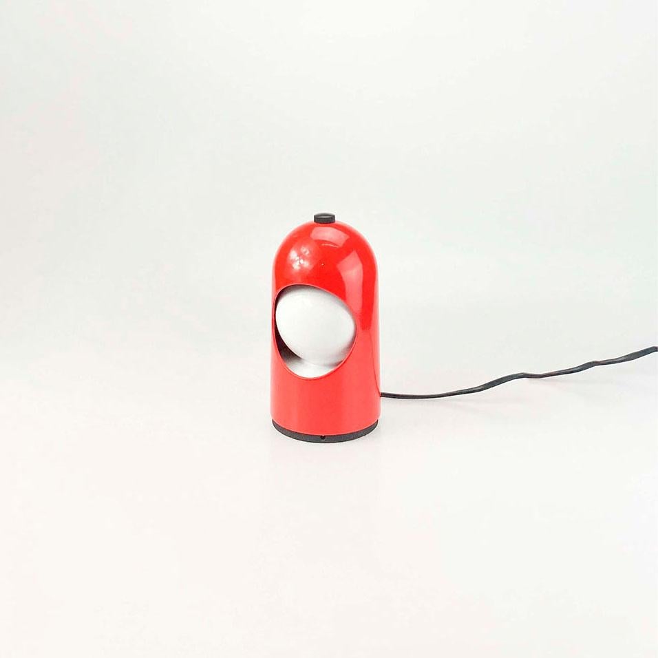 Selene Model Lamp, Italy 1970's

Metal lacquered in orange and white, plastic base.

Measurements: 20x9 cm.