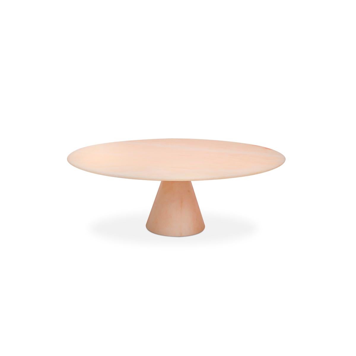 Selene is a stand in Rosa Portogallo, a preciuous pale pink kind of marble. This piece is part of the Lunar Landscape designed by Elisa Ossino, who conceived for Paola C. a tableware collection, revisiting the Classic themes of mise en place and the