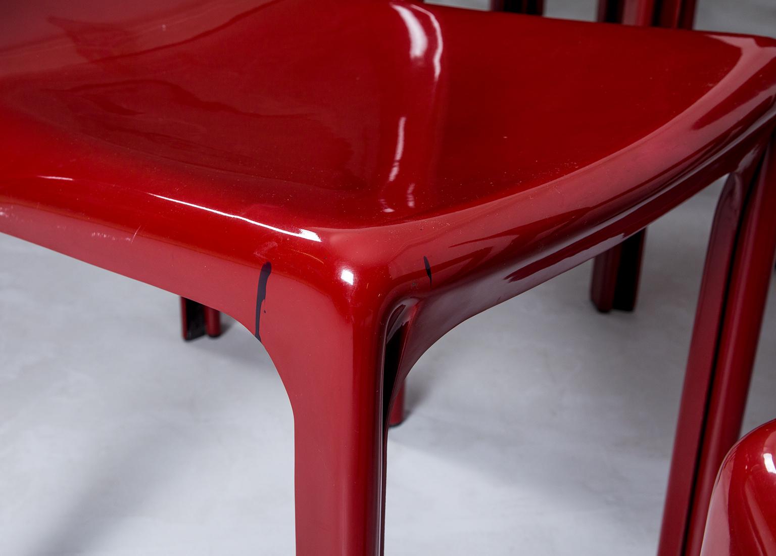 Selene Stacking Chairs by Vico Magistretti for Artemide in Dark Red 1