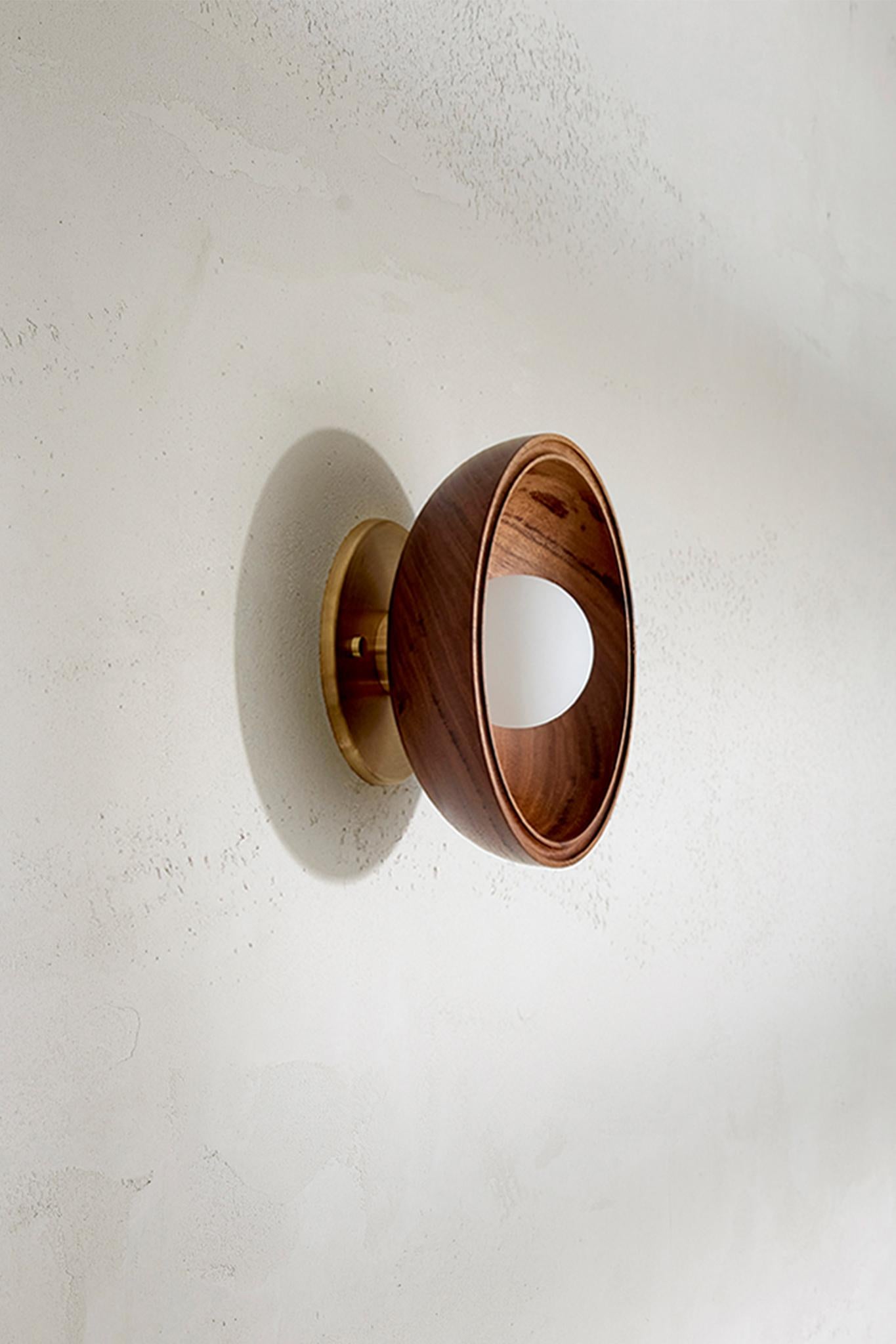  The Selene Surface Sconce has been inversely repurposed from the FSC-certified timber of our Terra 00 range. Suitable as a wall light or ceiling light in both residential and commercial projects, the Selene Surface Sconce offers a tactile warmth