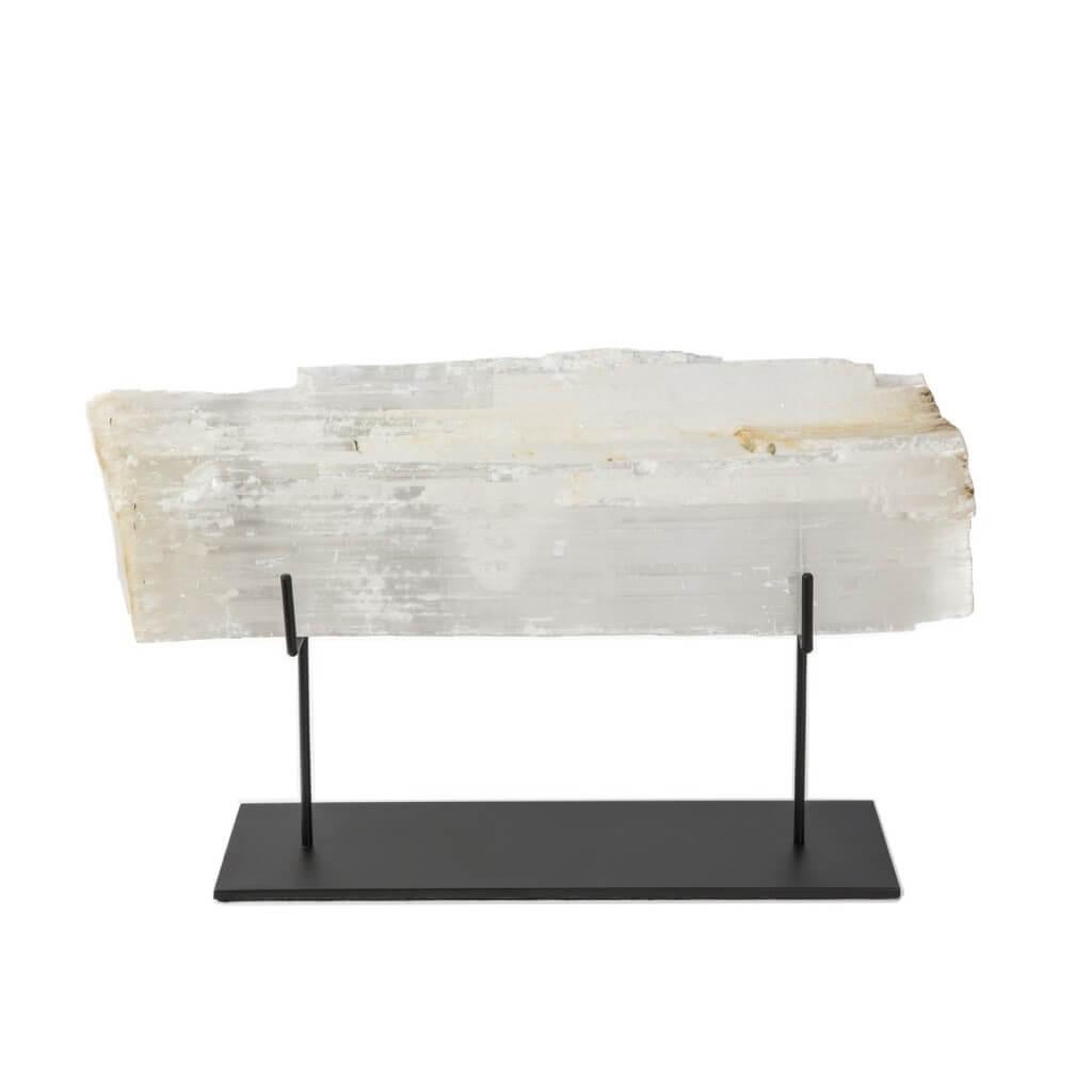 Beautiful Selenite Log on a Custom Black Stand. Uniquely shaped, real sourced selenite. Finish on Base is Matte Black