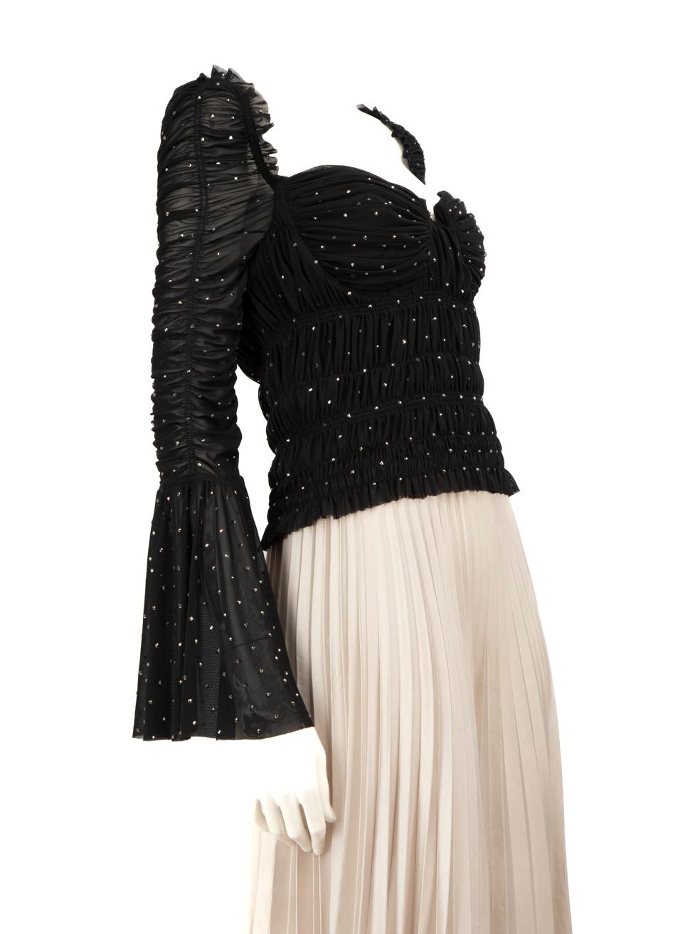 CONDITION is Very good. Minimal wear to the top is evident, there is a small pull to the weave on the front right side of the bust area on this used Self-Portrait designer resale item.
  
  
  
  Details
  
  
  Black
  
  Synthetic
  
  Top
  
 