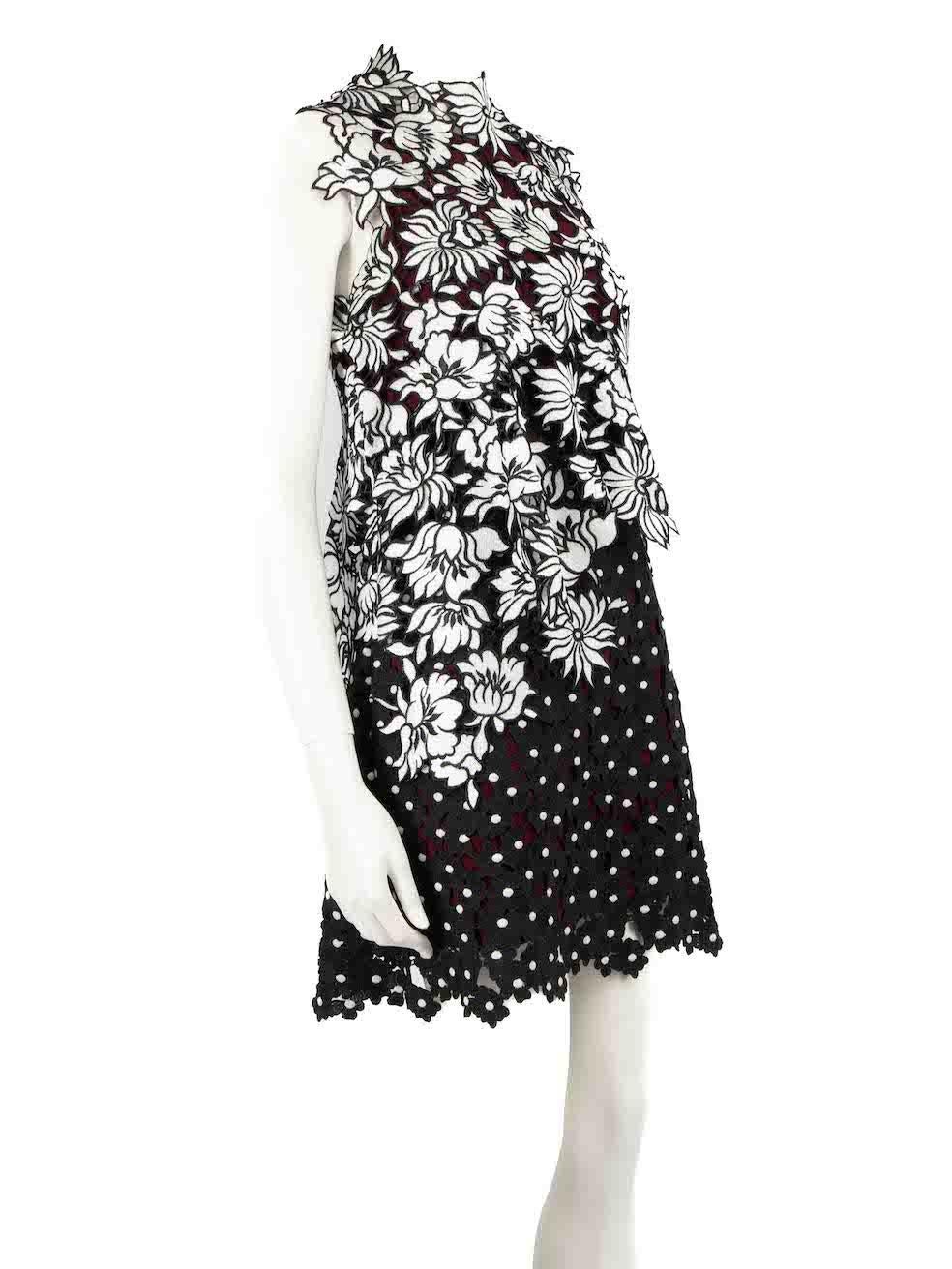 CONDITION is Very good. Minimal wear to dress is evident. Minimal wear to the floral embroidery at the left-side of bust with a loose thread on this used Self-Portrait designer resale item.
 
 
 
 Details
 
 
 Black
 
 Polyester
 
 Dress
 
 Floral