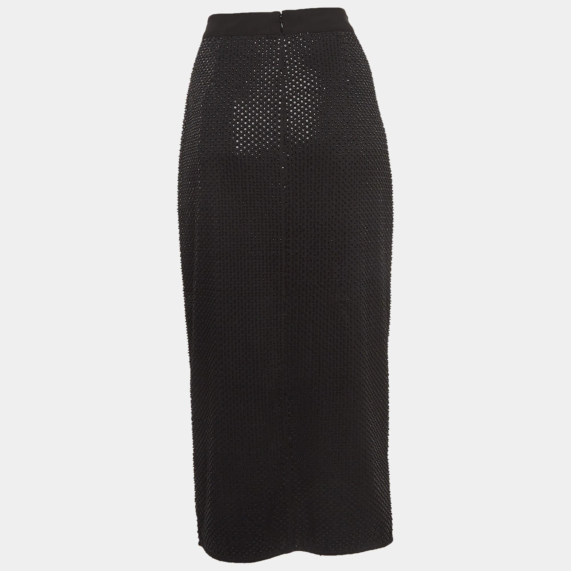 This elegant skirt is worth adding to your closet! Crafted from fine materials, it is exquisitely designed into a flattering shape.

Includes: brand tag

