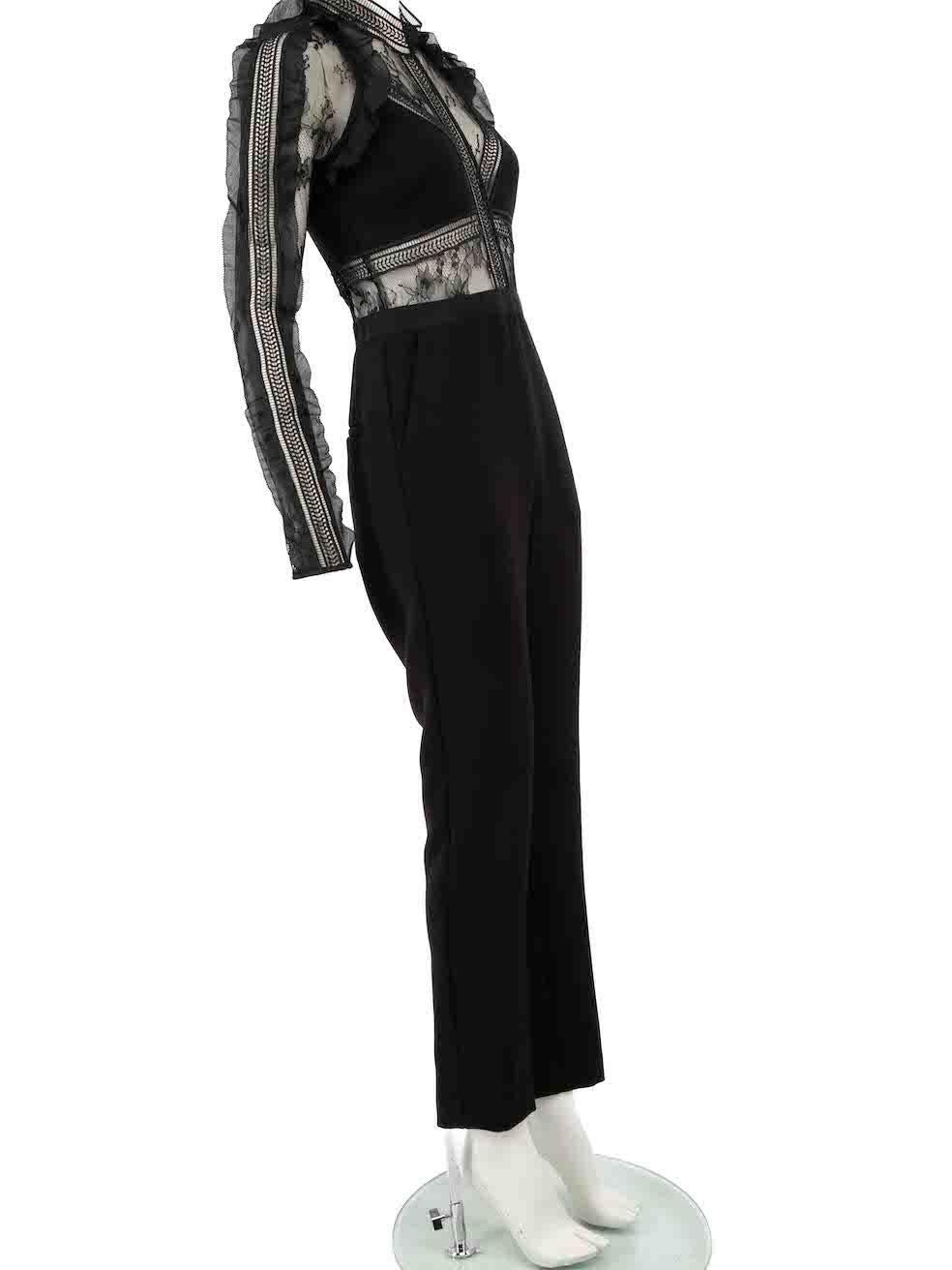 CONDITION is Very good. Hardly any visible wear to jumpsuit is evident on this used Self-Portrait designer resale item.
 
 
 
 Details
 
 
 Black
 
 Polyester
 
 Jumpsuit
 
 Sheer lace panel
 
 Long sleeves
 
 Back zip and hook fastening
 
 Mock