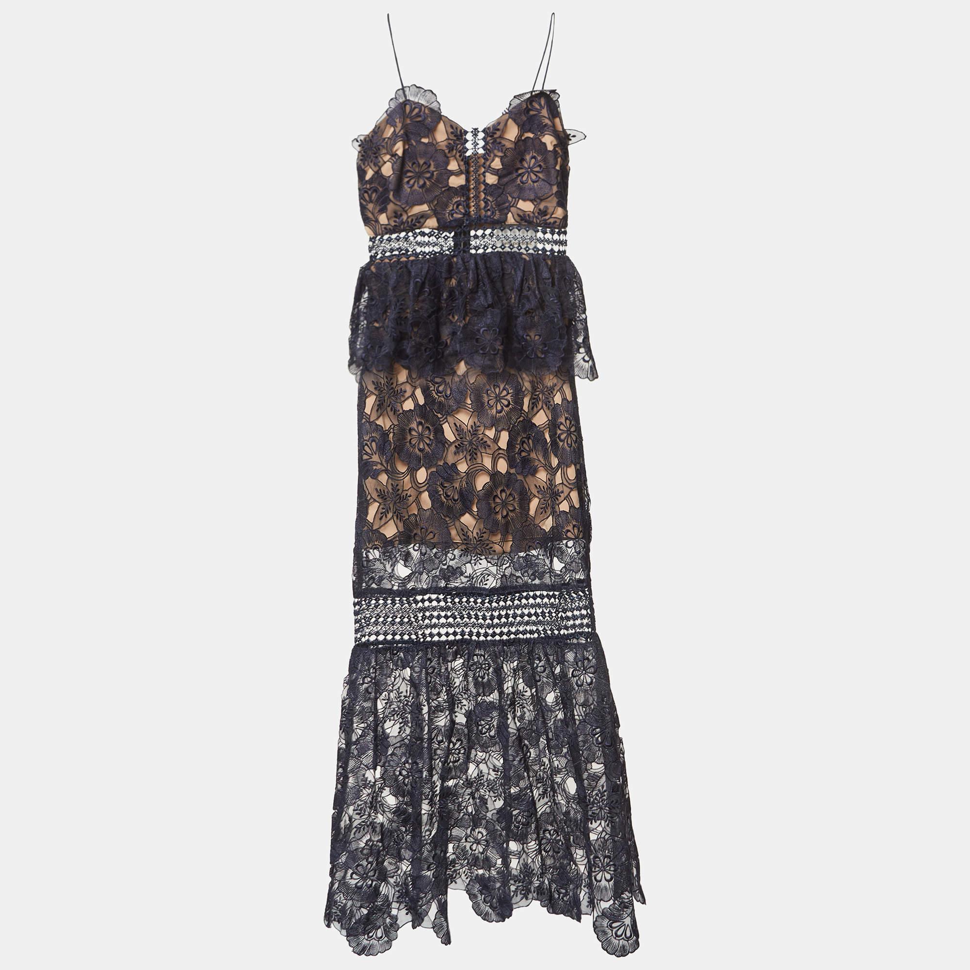 Self-Portrait's idea of femininity and modern approach to silhouettes are evident in this sleeveless dress. Featuring a floral lace design, the gorgeous dress offers a comfortable fit and a beautiful impact.

Includes: Black dust bag, brand tag

