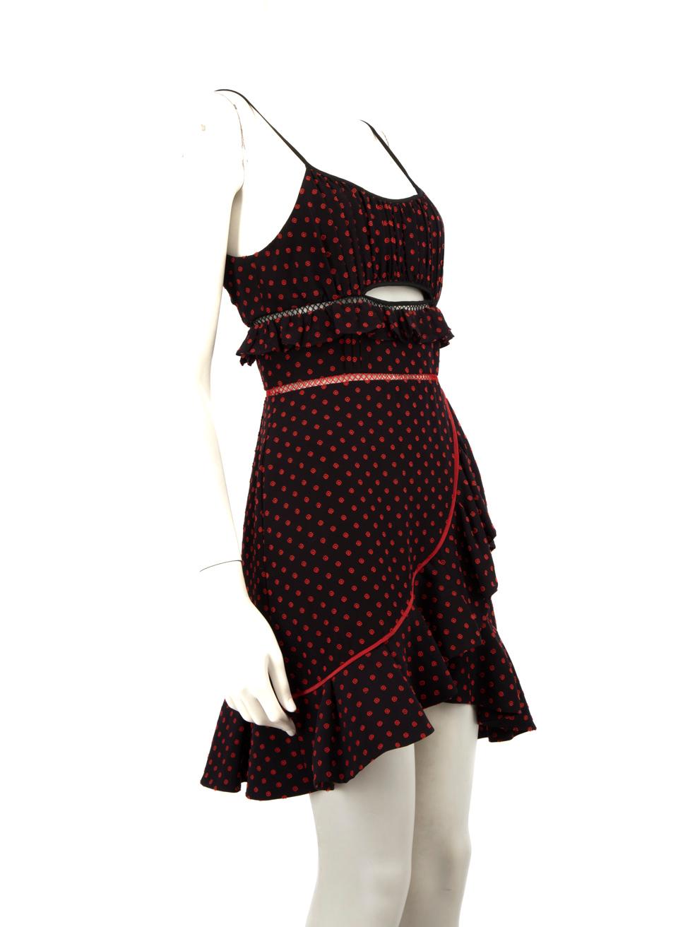 CONDITION is Good. Minor wear to the dress s evident. Light discolouration to the inside label and on the centre front below the waist. Discolouration may need gentle hand wash contrary to dry clean instructions. Plucks to the weave on the pipping