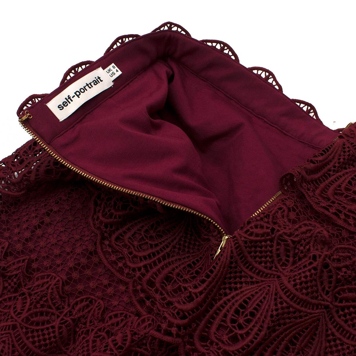 Self Portrait Burgundy Tiered Lace Skirt

- Burgundy mini skirt
- Lightweight
- Lace
- Tiered ruffle trim
- Centre-back hook-and-eye and zip fastening
- Scalloped hem
- 100% polyester. Lining: 65% rayon & 35% polyamide.

Please note, these items are