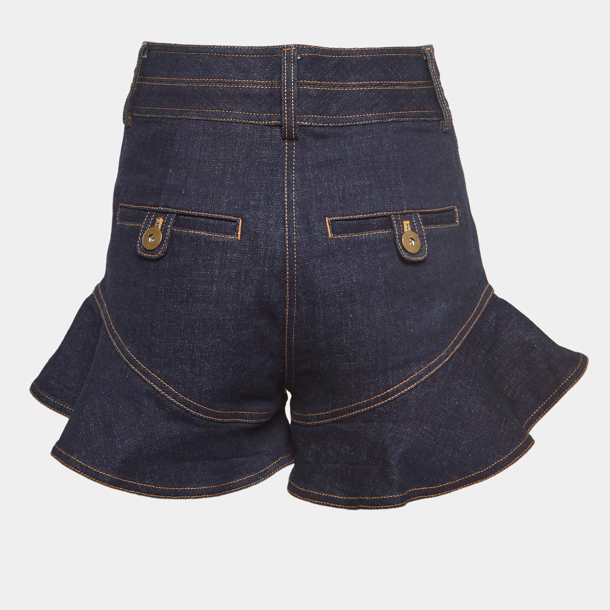 Relaxed days call for a pair of shorts like this. Stitched using high-quality fabric, these designer shorts are styled with classic details and have a superb length. Wear them with T-shirts.