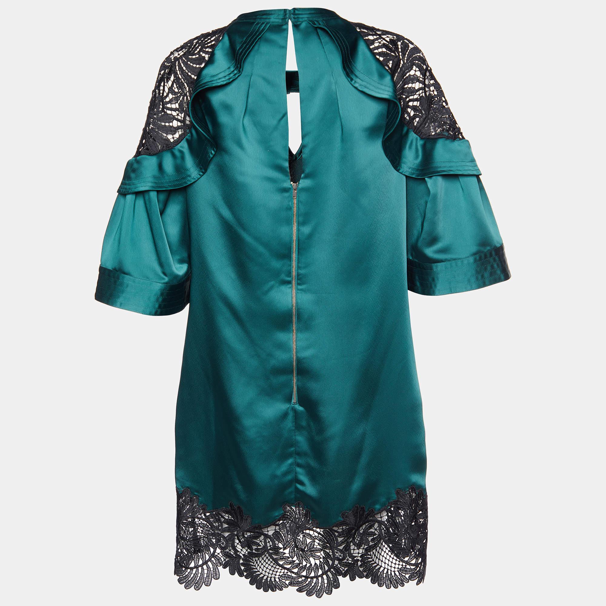 Exhibit a stylish look by wearing this beautiful designer dress. Tailored using fine fabric this dress has a chic silhouette for a framing fit. Style the creation with chic accessories and pumps.