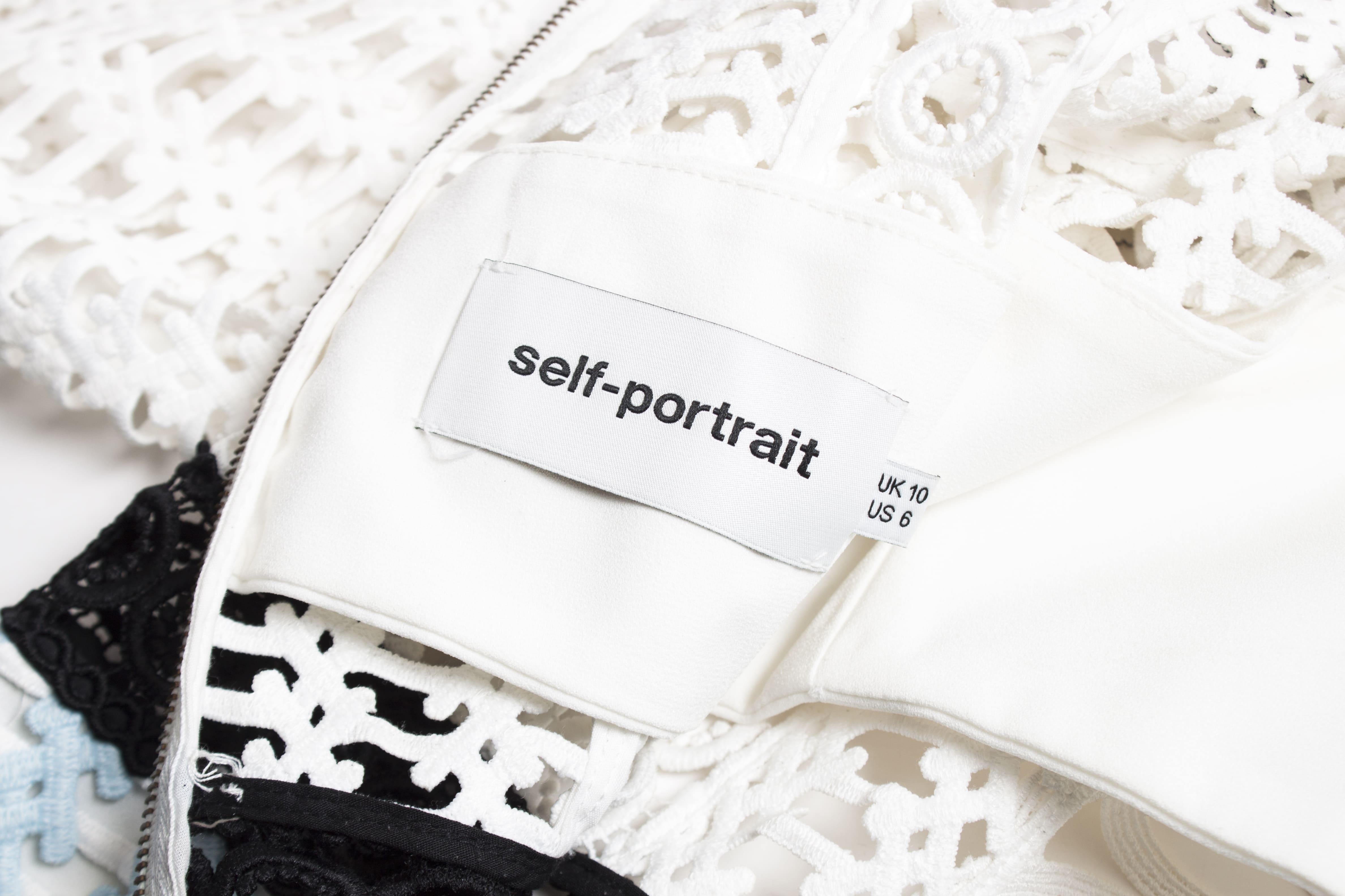 Self Portrait, Frill shoulder panel lace mini dress In Good Condition For Sale In AMSTERDAM, NL