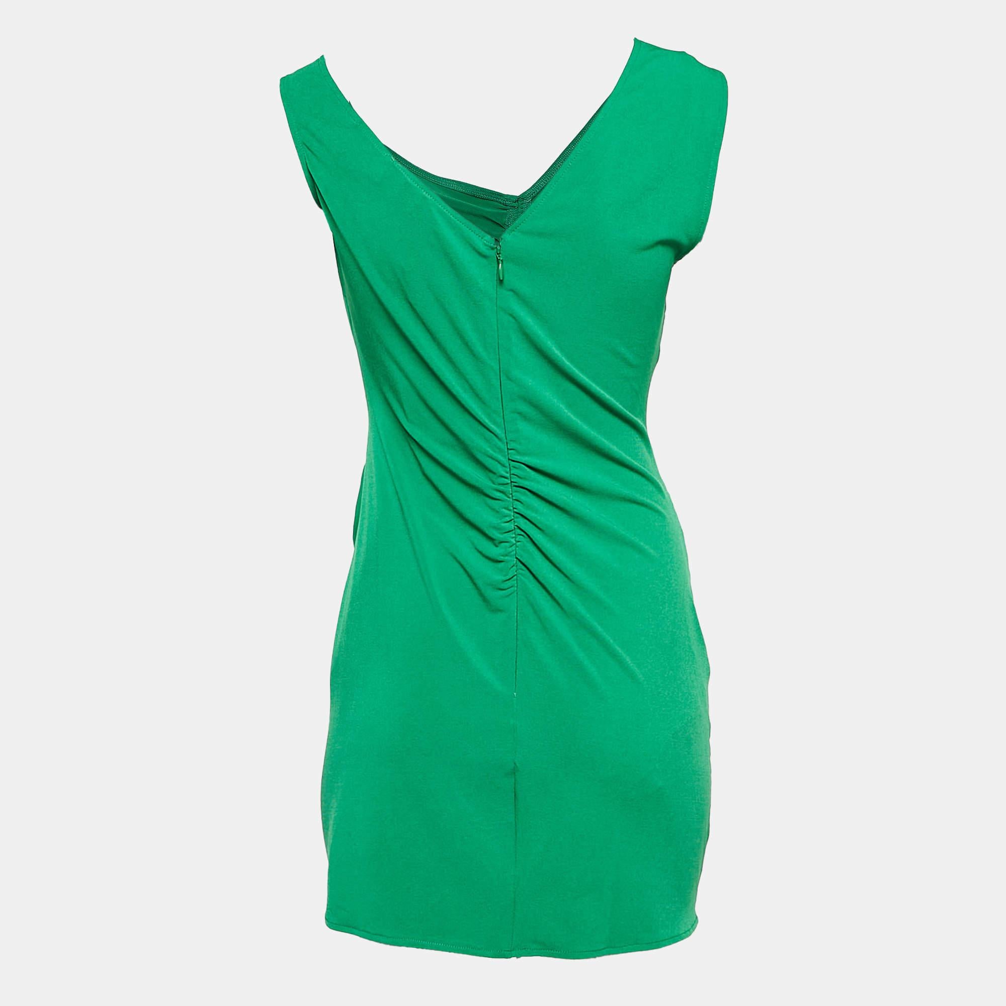 This designer dress is a chic and stylish garment that exudes elegance and sophistication. With its sleek design flattering silhouette and high quality craftsmanship this dress is perfect for any special occasion or evening event ensuring you stand