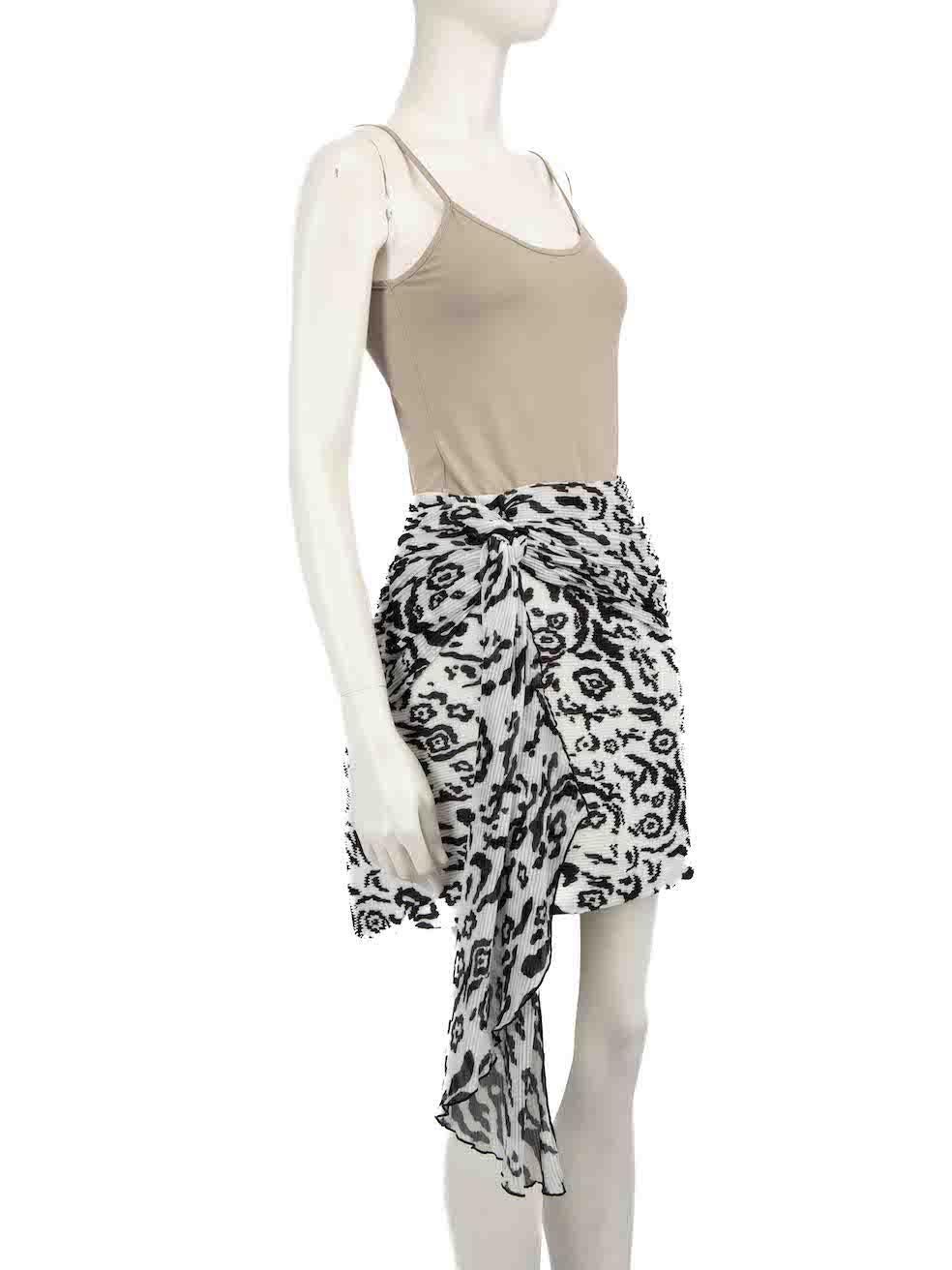 CONDITION is Never worn, with tags. No visible wear to skirt is evident on this new Self-Portrait designer resale item.
 
 
 
 Details
 
 
 White
 
 Polyester
 
 Skirt
 
 Black leopard print
 
 Mini
 
 Plissé pleats
 
 Draped detail
 
 Back zip and