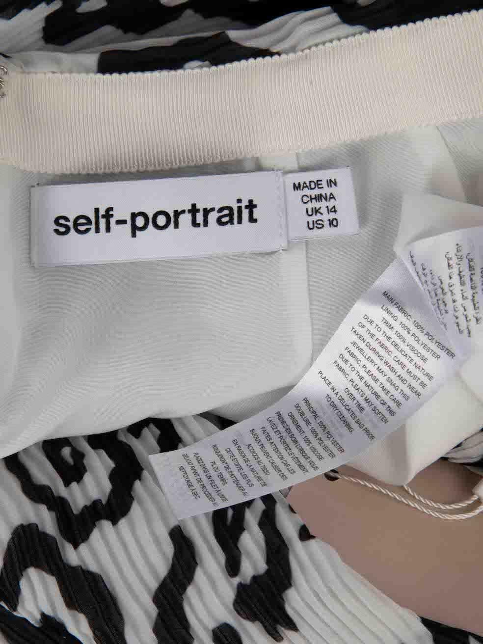 Mini jupe en plissé léopard de Self-Portrait Taille XL Pour femmes en vente