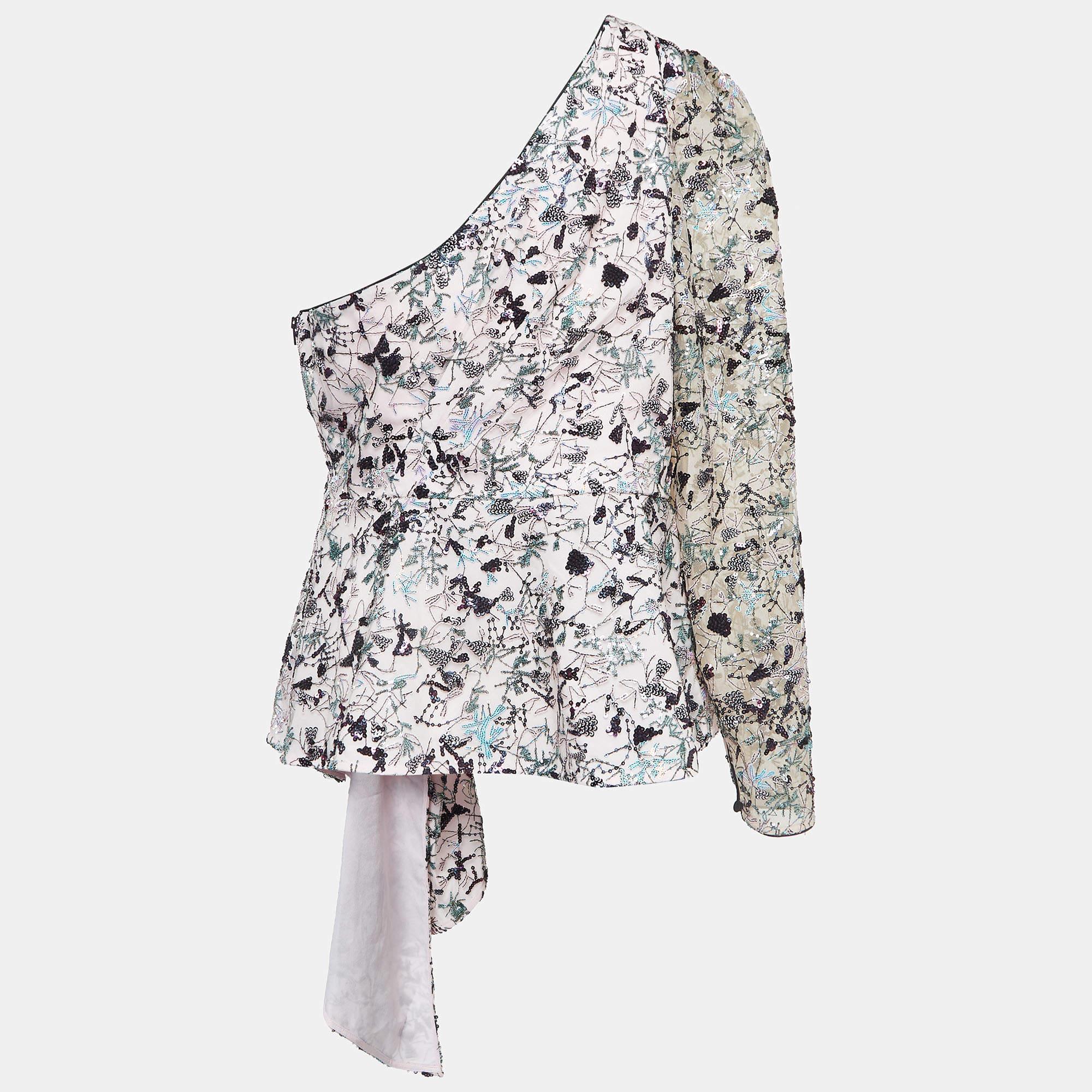 Find great style and comfort while wearing this designer top. Tailored using the best fabrics the creation has been given immense detail. Style it with a pair of jeans and flats.