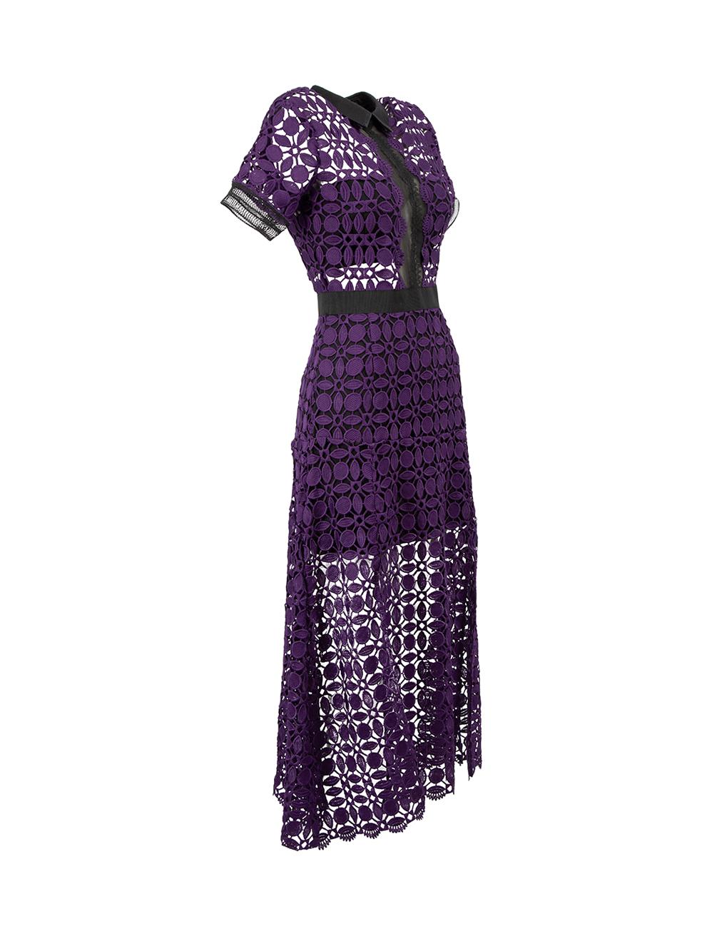 CONDITION is Good. Minor wear to dress is evident. Light wear to embroidery at centre front with some pulled threads found, very mild discolouration also seen through the internal lining and at collar on this used Self-Portrait designer resale
