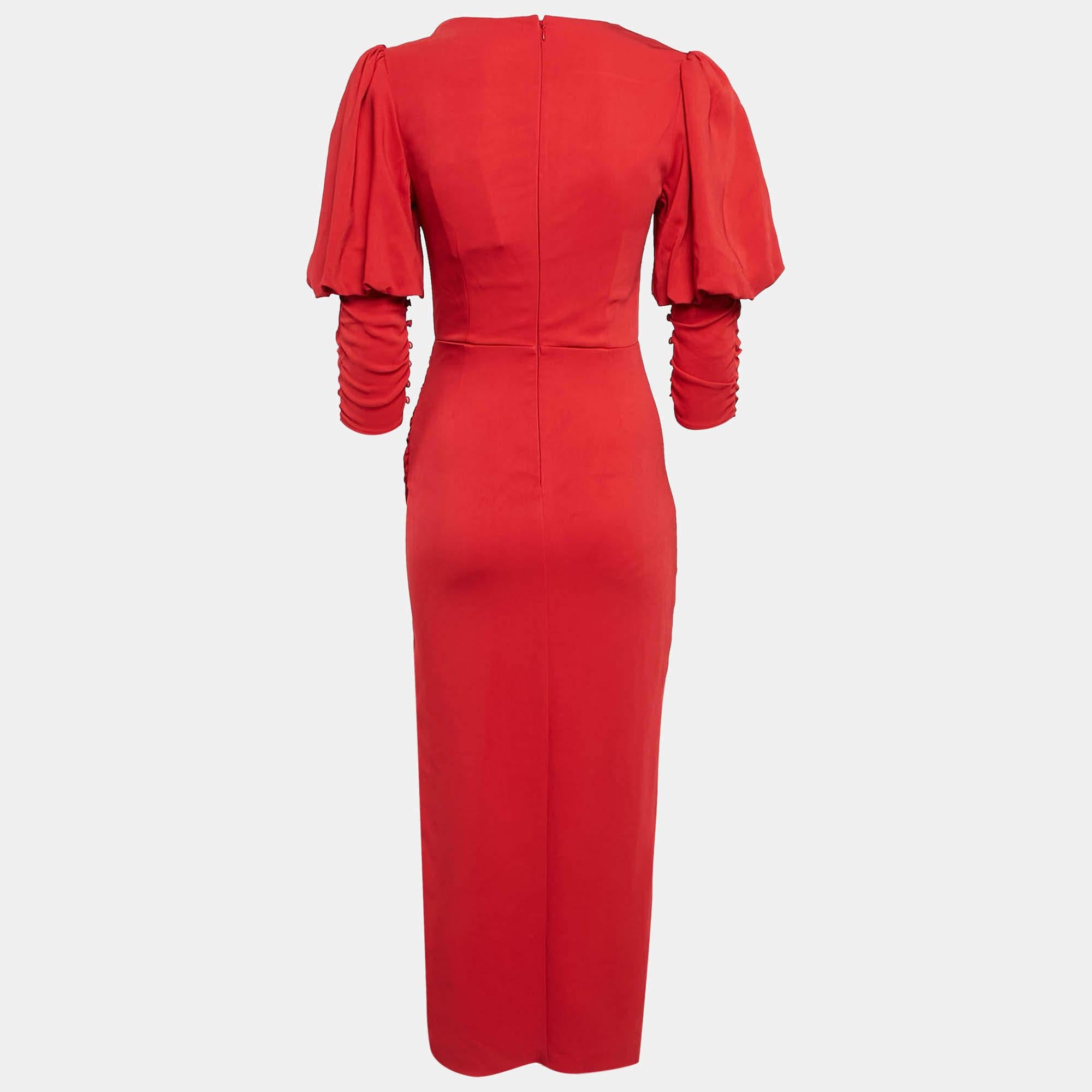 This stylish midi dress exudes elegance and sophistication. Its flattering length falls between the knee and ankle offering a versatile option for various occasions. With its chic design it combines modern trends with timeless charm making it a must