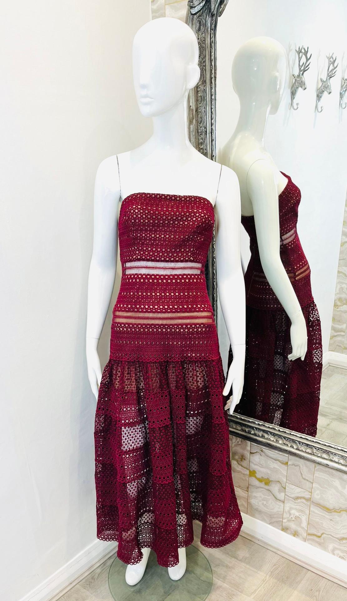 Self-Portrait Sculpted Lace Dress

Burgundy wine sleeveless dress designed with intricate lace details.

Featuring fit-and-flare silhouette, waisted style and partial nude lining.

Accented with see-through detailing to the skirt and zip fastening