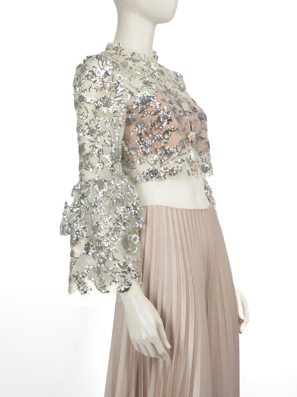 CONDITION is Very good. Minimal wear to the top is evident. Discolouration around the neckline, the back neck designer label and on the lining on this used Self-Portrait designer resale item. Discolouration may need gentle hand wash contrary to dry
