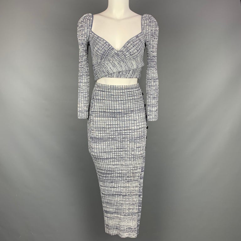 SELF-PORTRAIT Spring 2021 collection casual top comes in a blue & grey marbled viscose blend featuring a crossover style and buttoned sleeves. Skirt sold separately.

Very Good Pre-Owned Condition.
Marked: S
Original Retail Price: