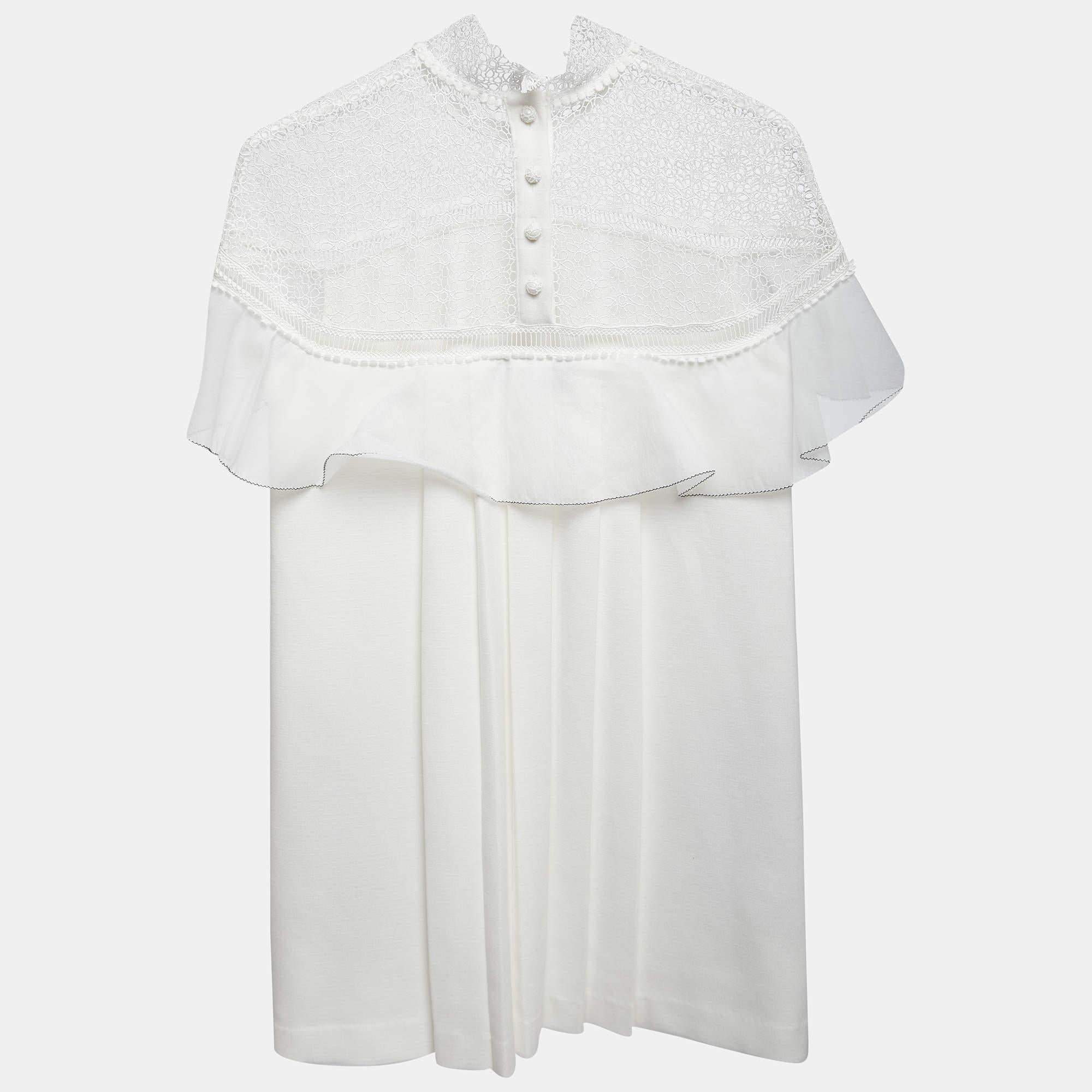Con un diseño elegante y sin esfuerzo, este minivestido Self Portrait es fácil de llevar y de complementar. Con un corte precioso, este vestido seguirá siendo uno de tus favoritos temporada tras temporada.