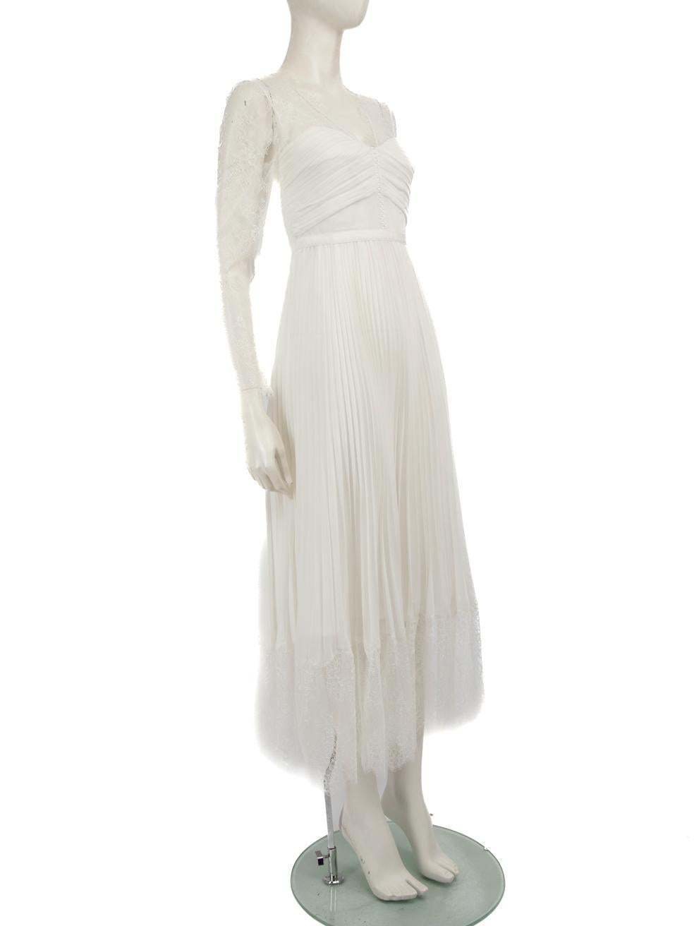 CONDITION is Very good. Hardly any visible wear to dress is evident on this used Self-Portrait designer resale item.
 
 Details
 White
 Polyester
 Dress
 See through lace top panel and sleeves
 Maxi
 V-neck
 Ruched front detail
 Pleated skirt
 Back