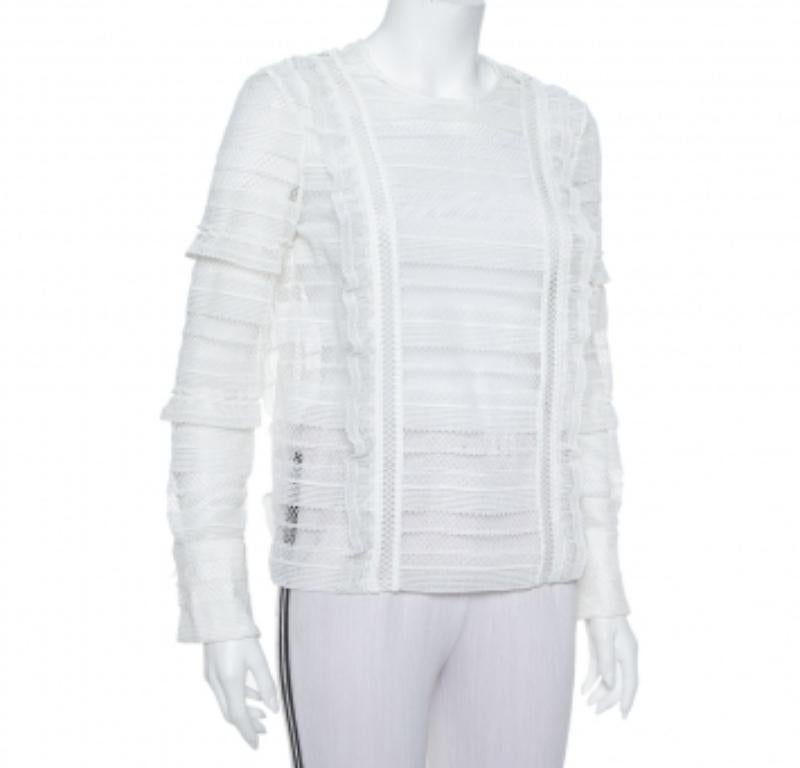 This sheer top comes from the iconic label of Self Portrait. It has a flattering silhouette and is made from beautiful lace in a white shade. It is designed with panels and comes equipped with a zip closure. Pair it with dark-hued pants, slingback