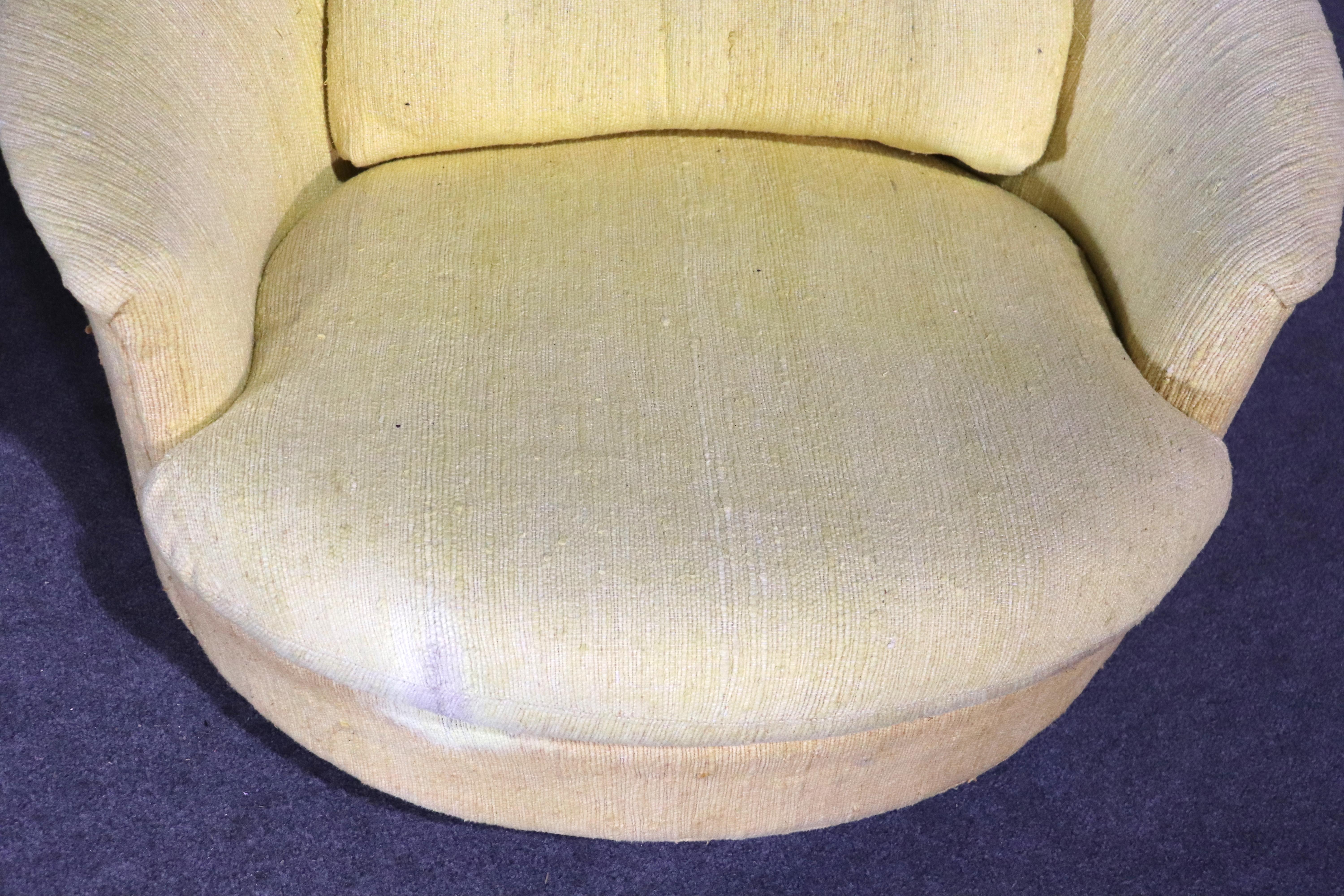 yellow swivel barrel chair