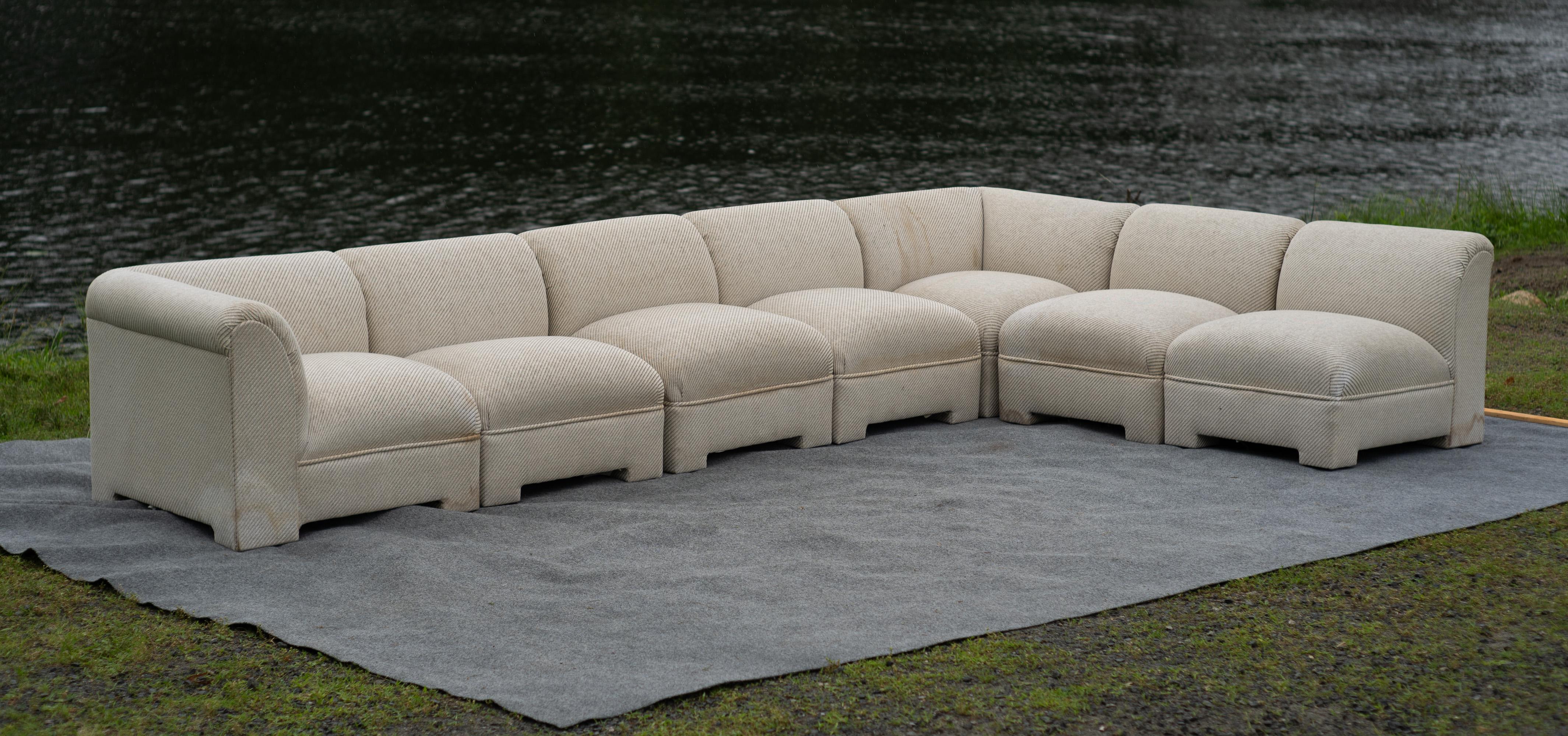 Designed and made in the USA, this 7-piece sectional sofa was produced by Selig in the early days of the company. Typically Selig is known today for importing Danish furniture and design, such as that of Kofod Larsen. However, their domestic