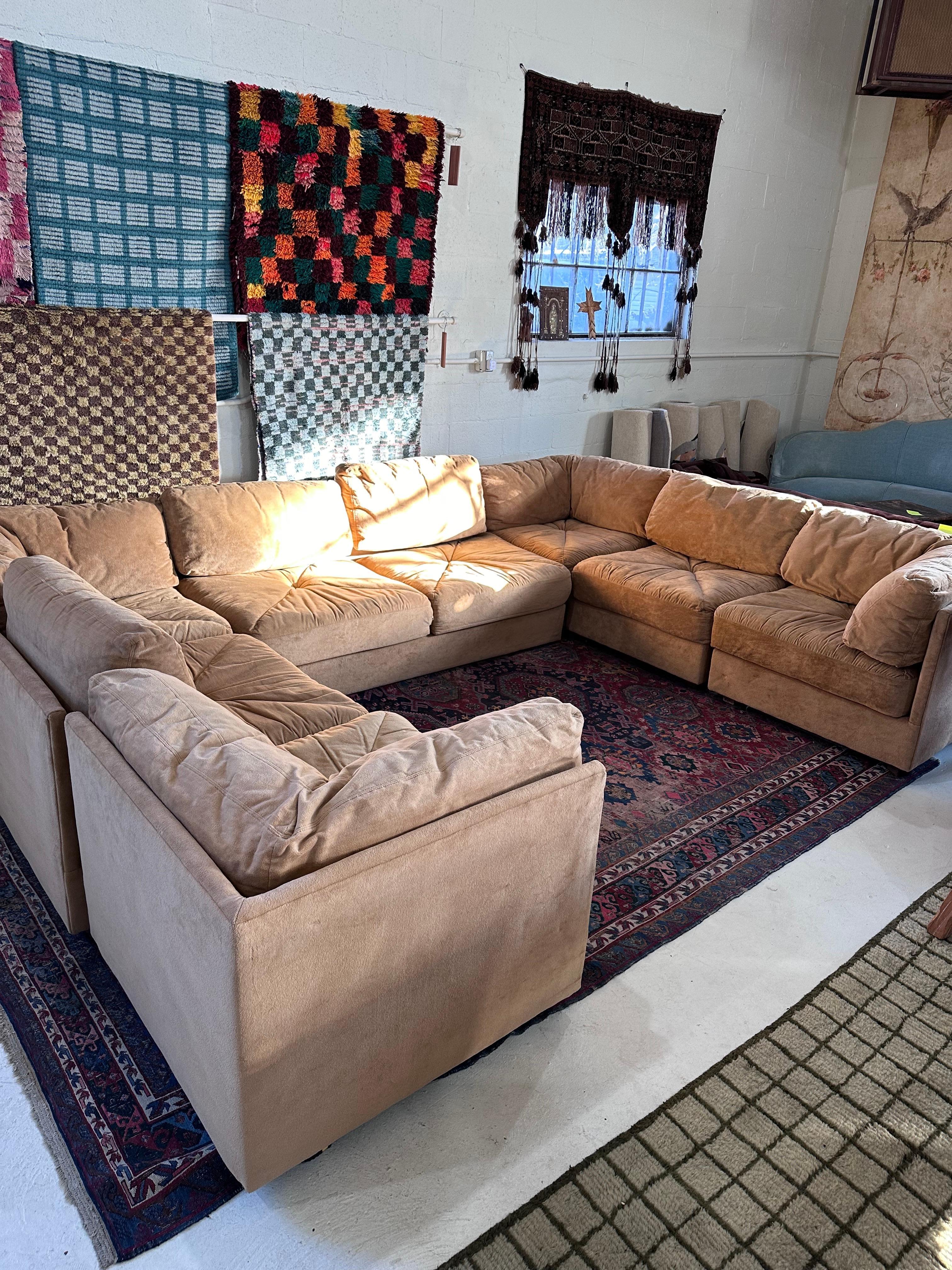 7-piece Milo Baughman style cube modular sofa with pullout full-sized bed. Original velvet-like upholstery is in perfect condition with only minor signs of age including a small rub and one small, almost unnoticed tear on the side of one section.