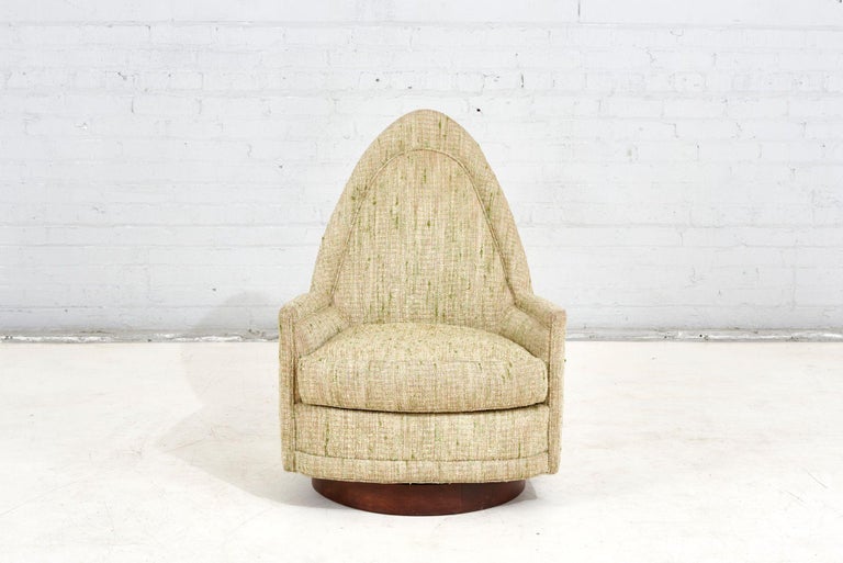 Selig Swivel lounge chair, 1960. Original upholstery with walnut plinth base.