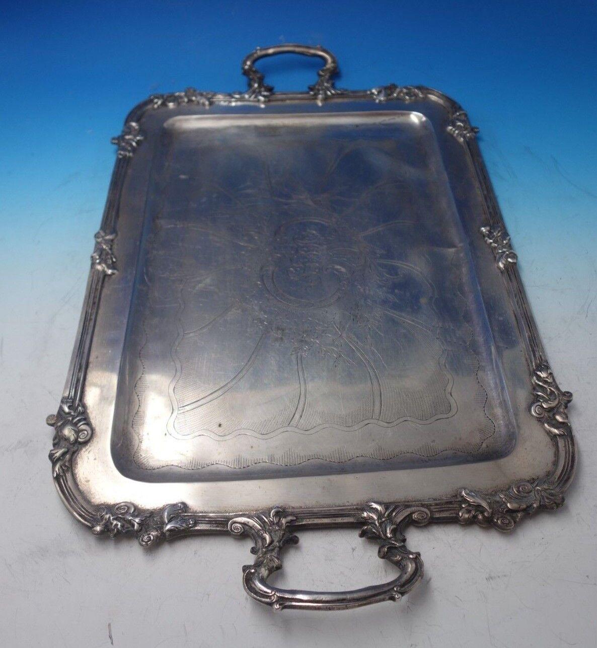 Seligmann

Fantastic Seligmann Austrian .800 silver tea tray featuring hand engraved flowers and leaves, circa 1872-1922. This piece measures 19 1/2