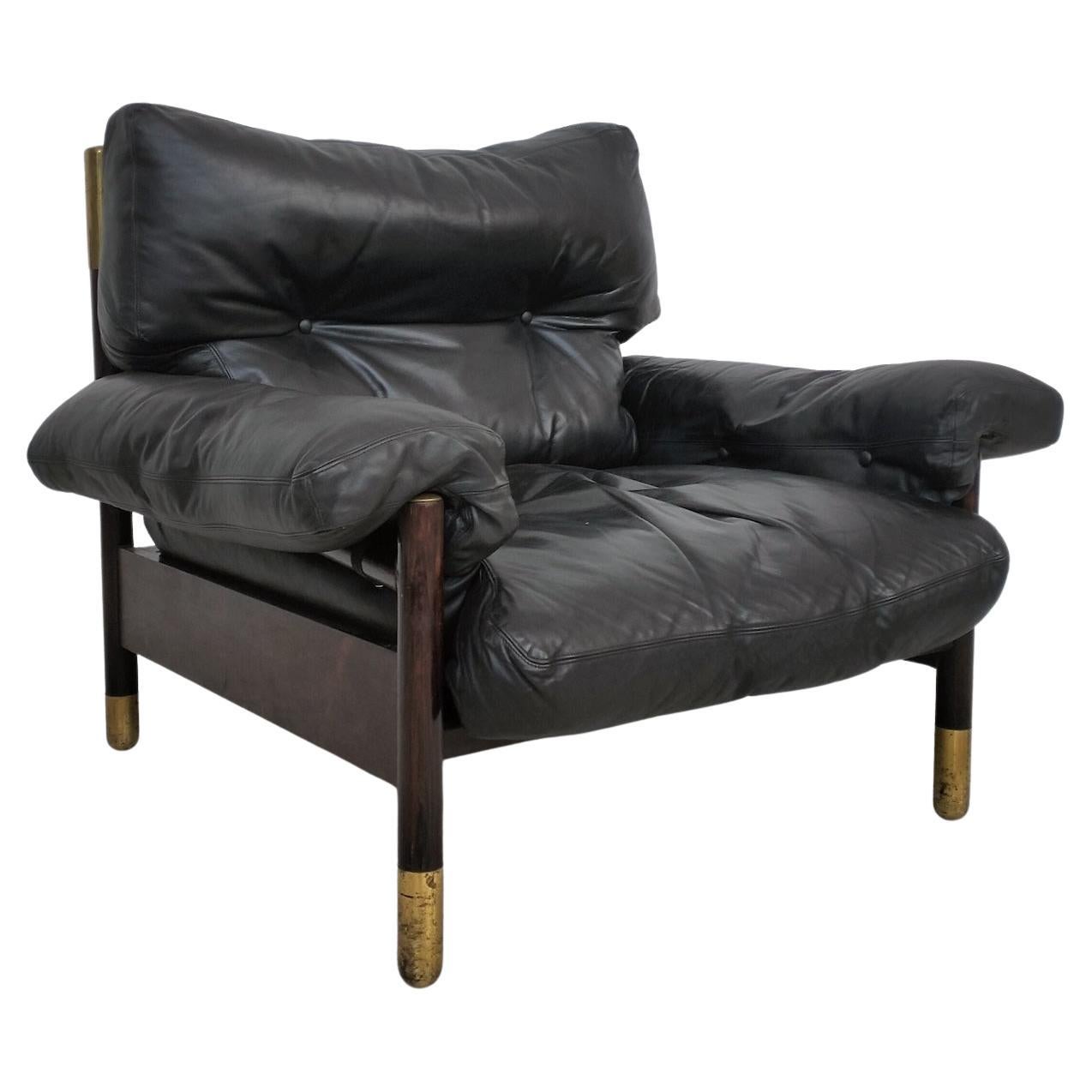 "Sella" leather and wooden armchair by Carlo De Carli for Sormani , 1960s