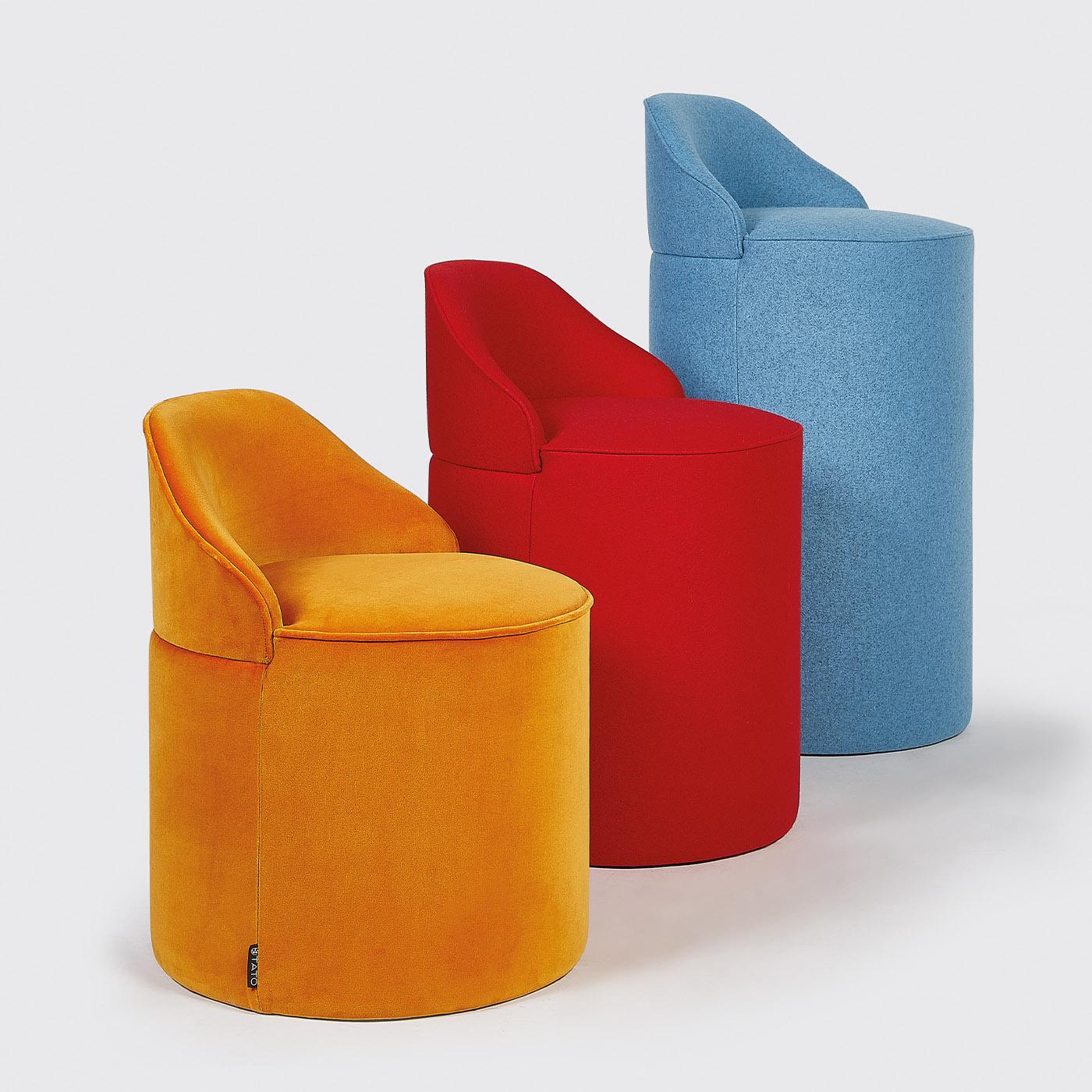 Comfortable and ergonomic qualities define this iconic design from the Sella Collection, a tall pouf inspired by the shape of a horse saddle. Distinguished by a light blue shade, it is entirely upholstered with felt wool, also available in velvet.