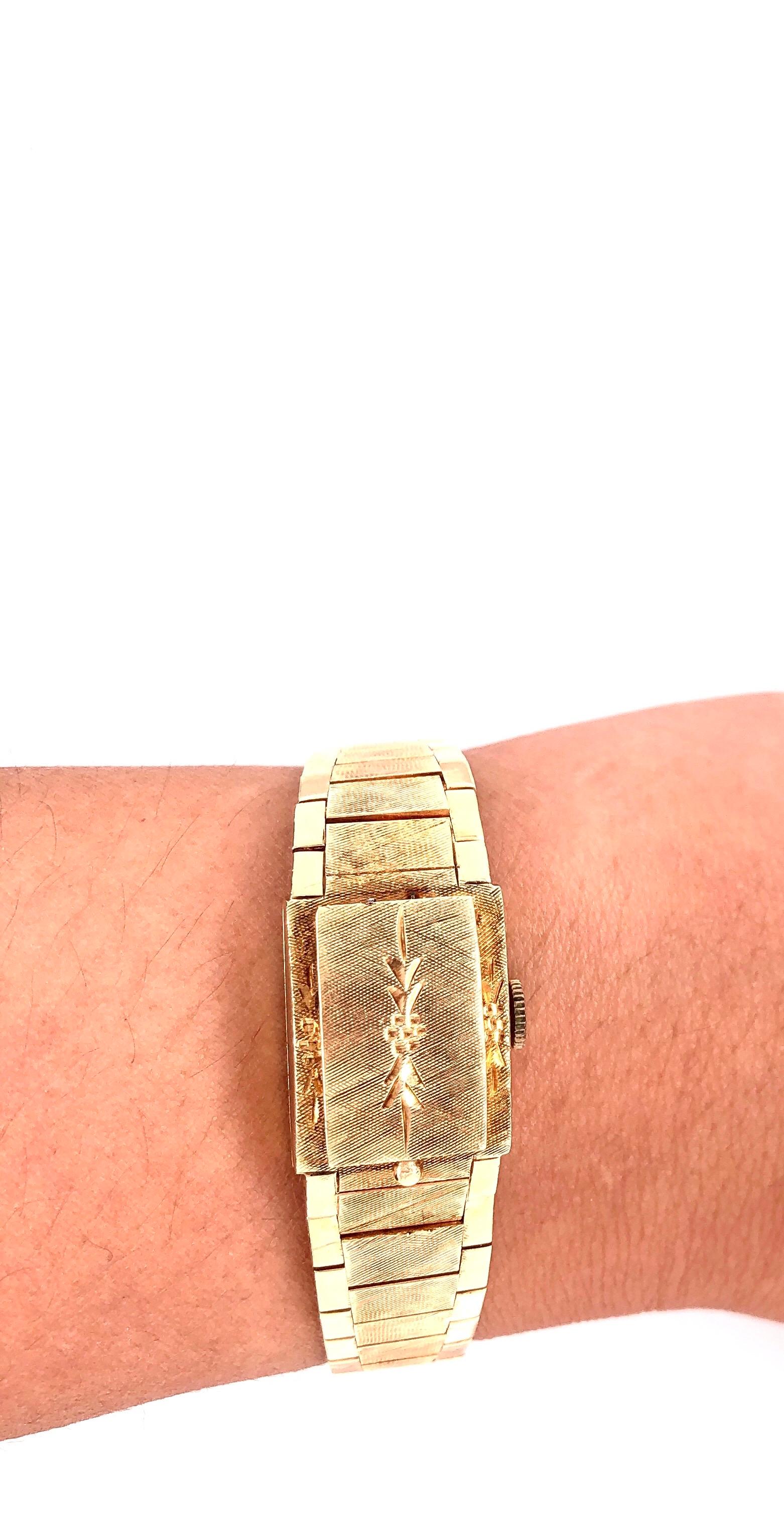 Sellita Montre-bracelet suisse pour femme en or 14 carats avec 17 rubis Bon état - En vente à Stamford, CT