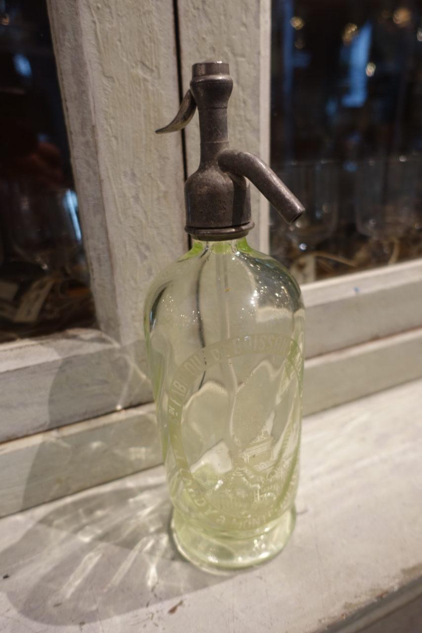 Gorgeous vintage seltzer bottle in thick quality rarely found palest lemon colored glass with super patina and a wonderful shape. Produced in Montceau les mines near Burgundy, circa 1900 and is the type was used throughout France in various bars and