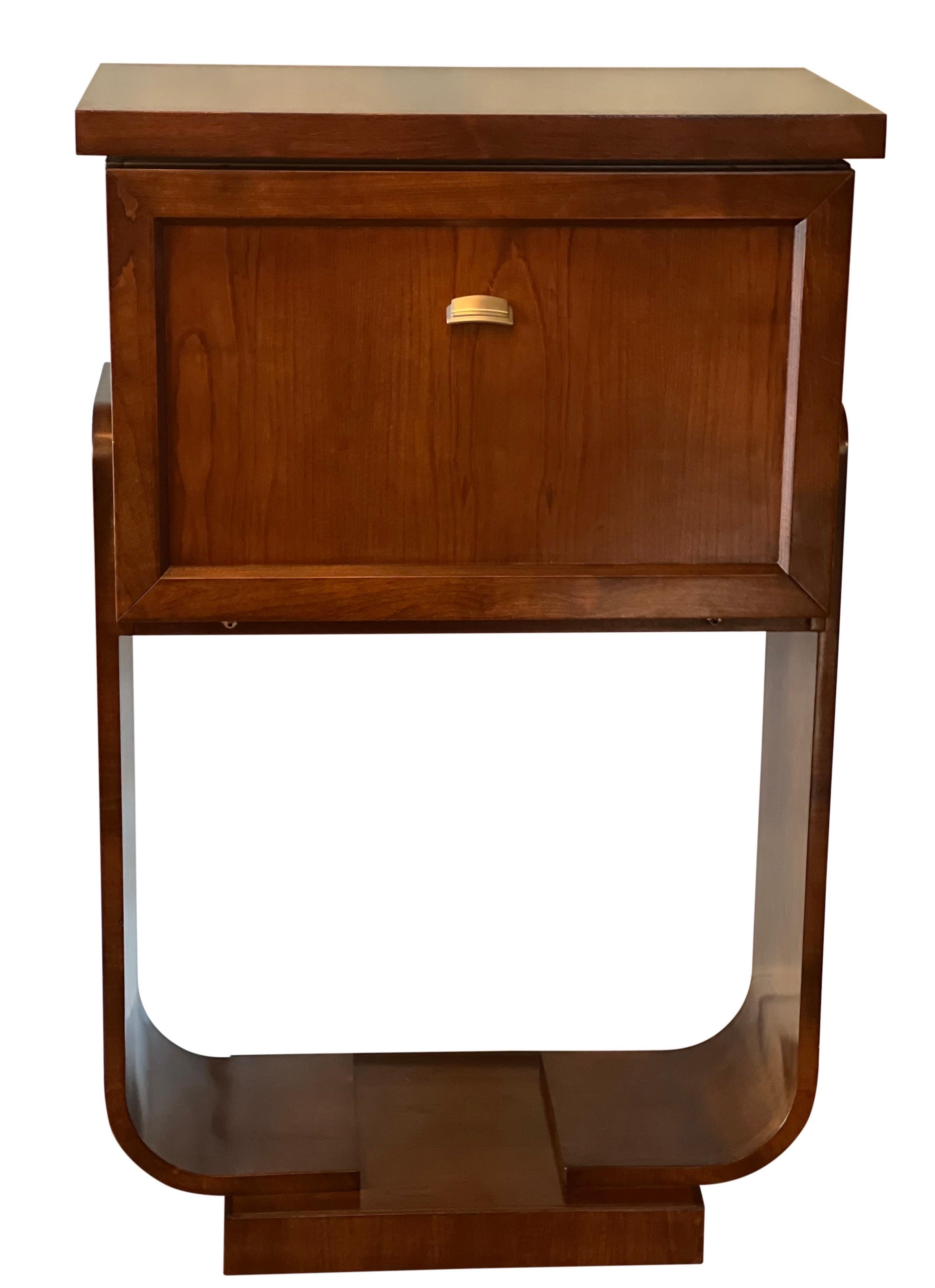 Exquisite Art Deco mahogany bar cabinet with drop front door by SELVA, Italy. 

This is a stunning cabinet expertly handcrafted by one of Italy's premier luxury furniture houses, SELVA, founded in 1968. The door gently pulls down to reveal