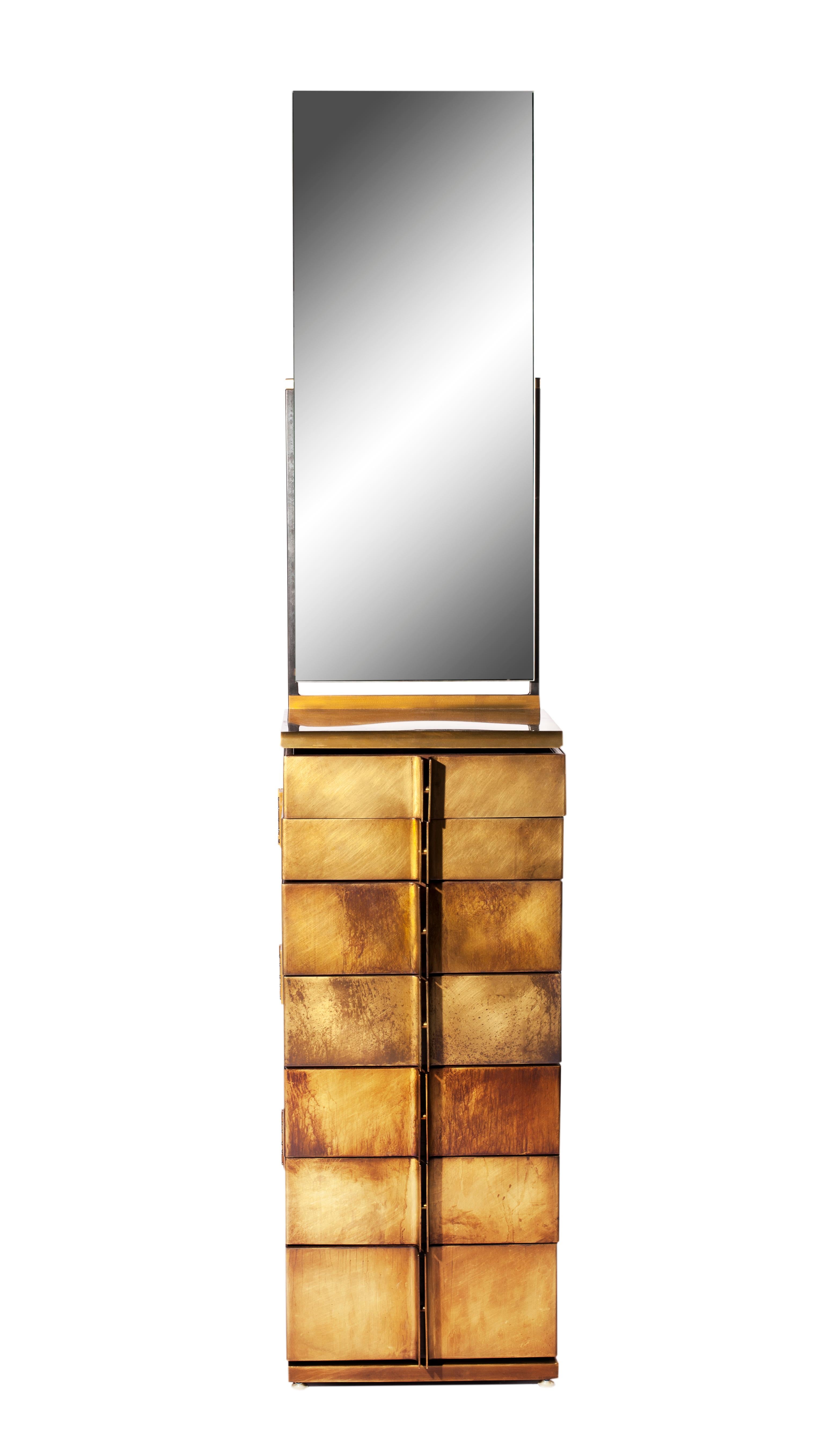 Semainier brass and walnut dresser by Gentner Design
Dimensions: D 35.5 x W 45.7 x H 218 cm
Materials: patinated brass, walnut wood

A modern take on a semainier, complete with vanity mirror and nine variable depth drawers, provides ample