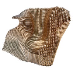 Semblance, a gold & clear glass woven standing sculpture by Cathryn Shilling