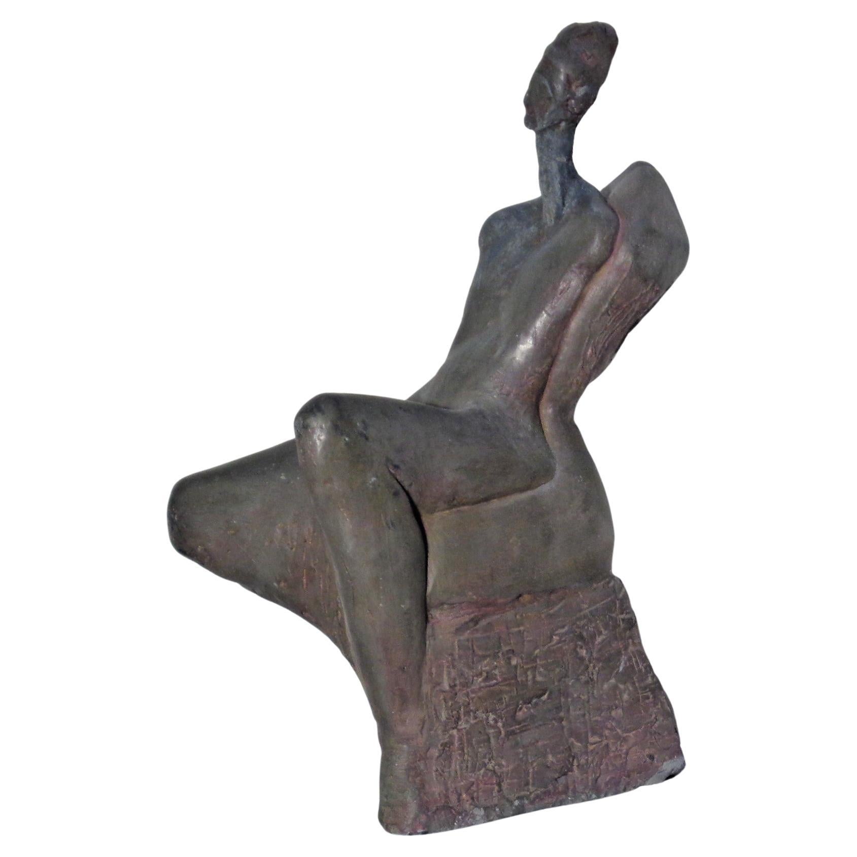 Modernist semi abstract sculpture of a seated nude woman in the style of Henry Moore, Hand built / hand tooled clay w/ burnished bronze gray glaze painted stone like surface, circa 1960-1970. Look at all pictures and read condition report in comment